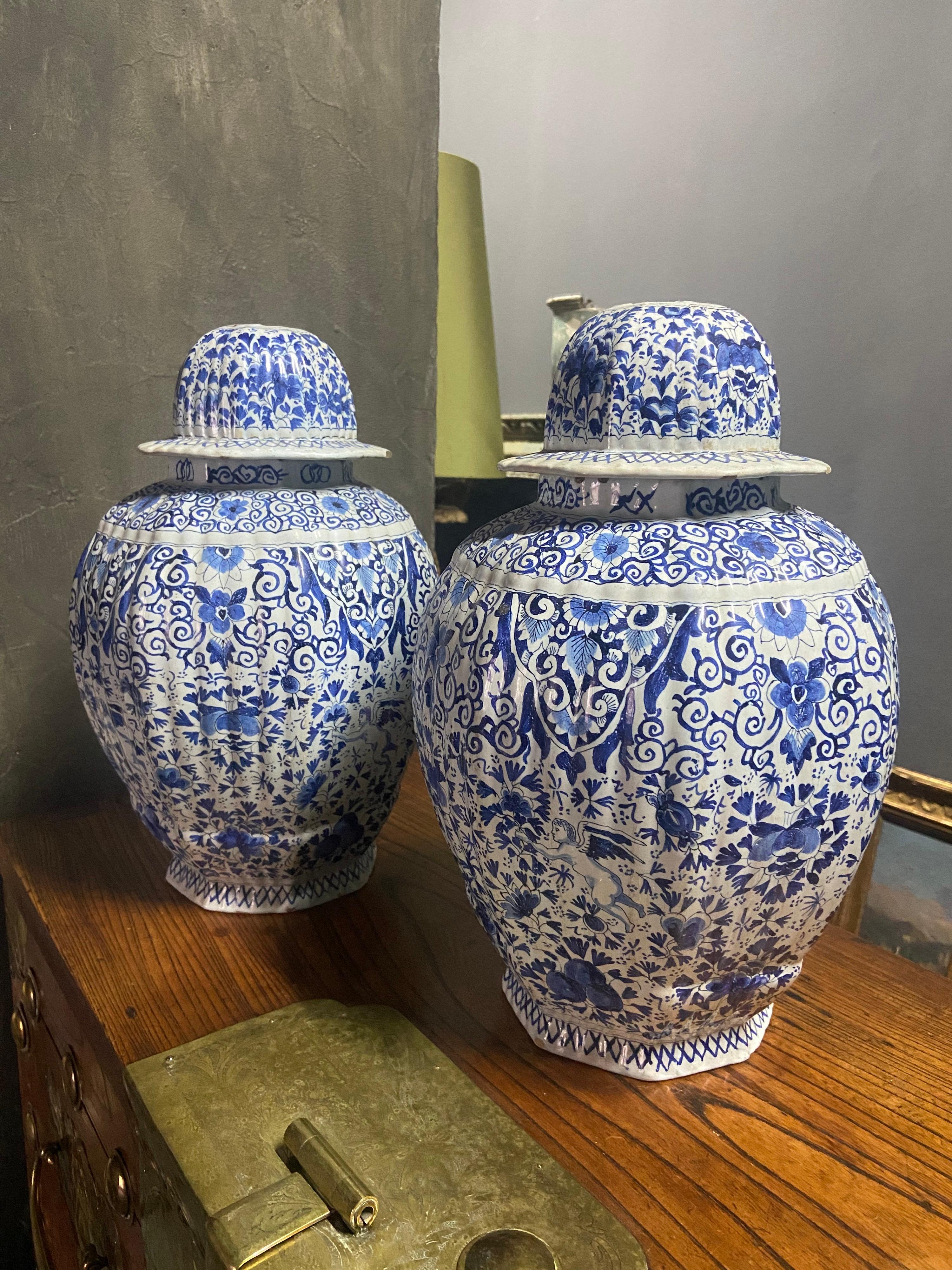 Pair of large ceramic jars made by Delft manufacturer in the late 19th century.
Both are having halls on the top and at the bottom probably in order to be electrified and to become beautiful table lamps.
Very good general condition and elegant
