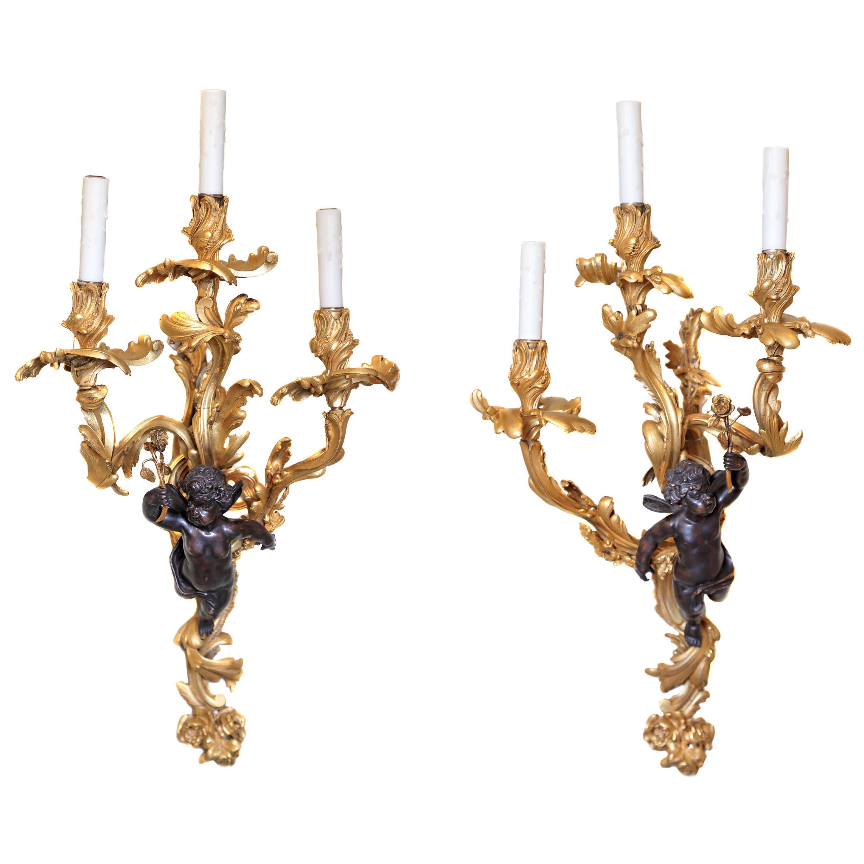 19th Century Pair of Large French Gilt Bronze and Patinated Cherub Sconces