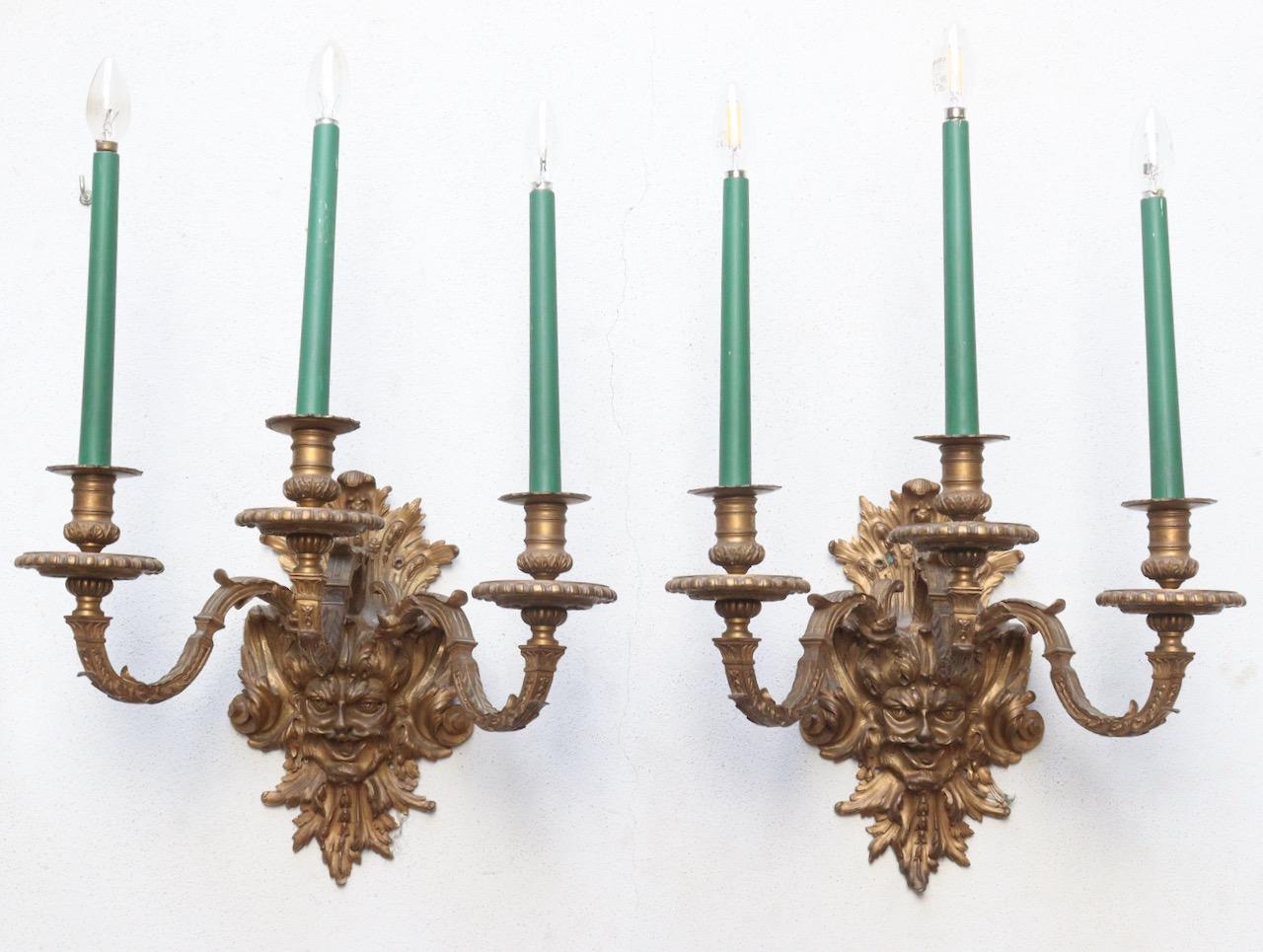 A Pair of Louis XIV Style Ormolu Satyre Wall-Lights,

A pair of gilt-bronze three arms 