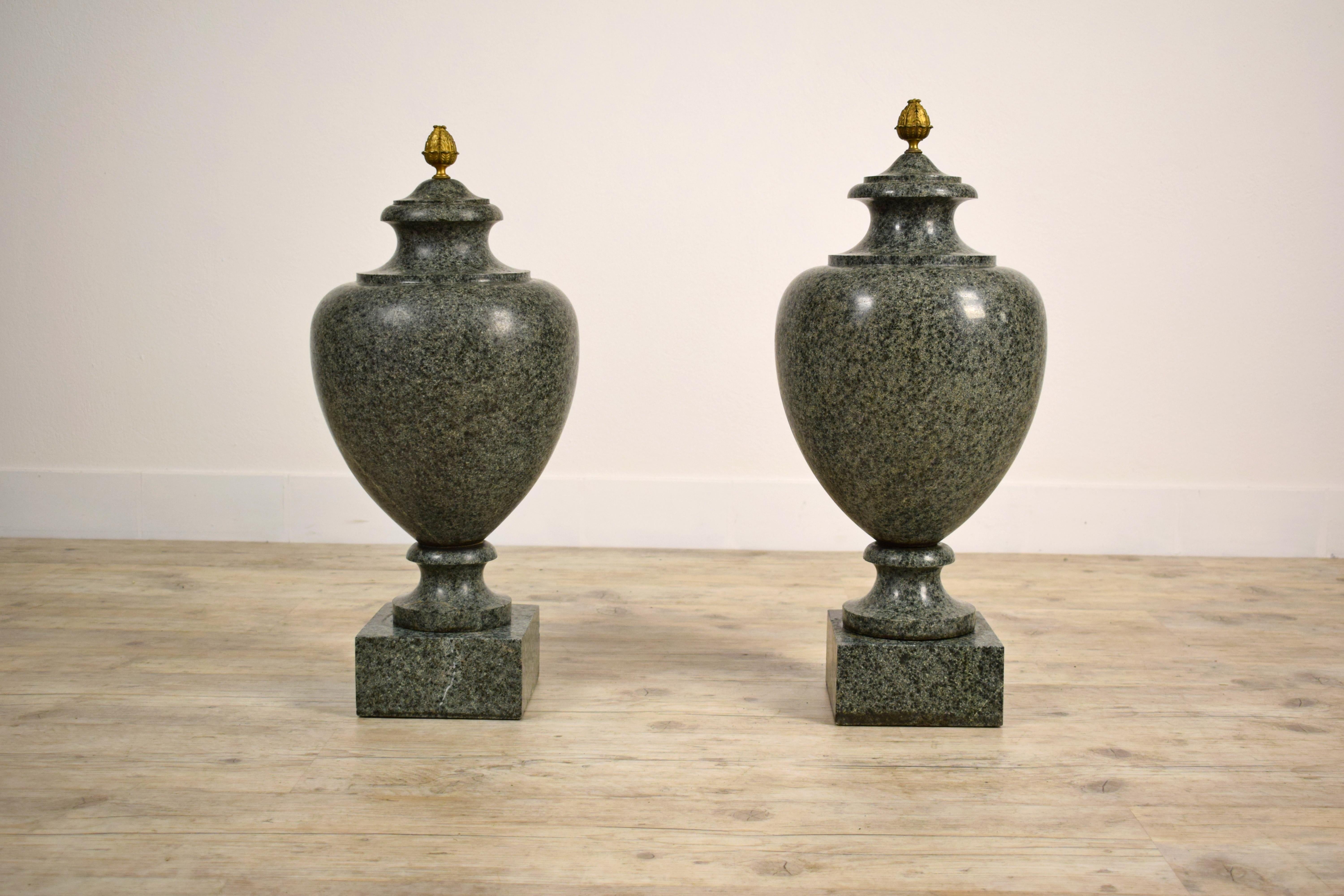 19th century, pair of Louis XVI style green granite vases
Measures: the vases have different sizes. Measures: Height 65 cm x diameter 30 cm; height 70 cm x diameter 30 cm

This elegant pair of vases, made of green granite in the nineteenth