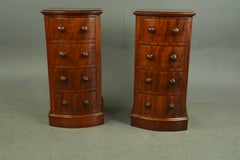 19th century pair of mahogany bow front bedside chests of drawers