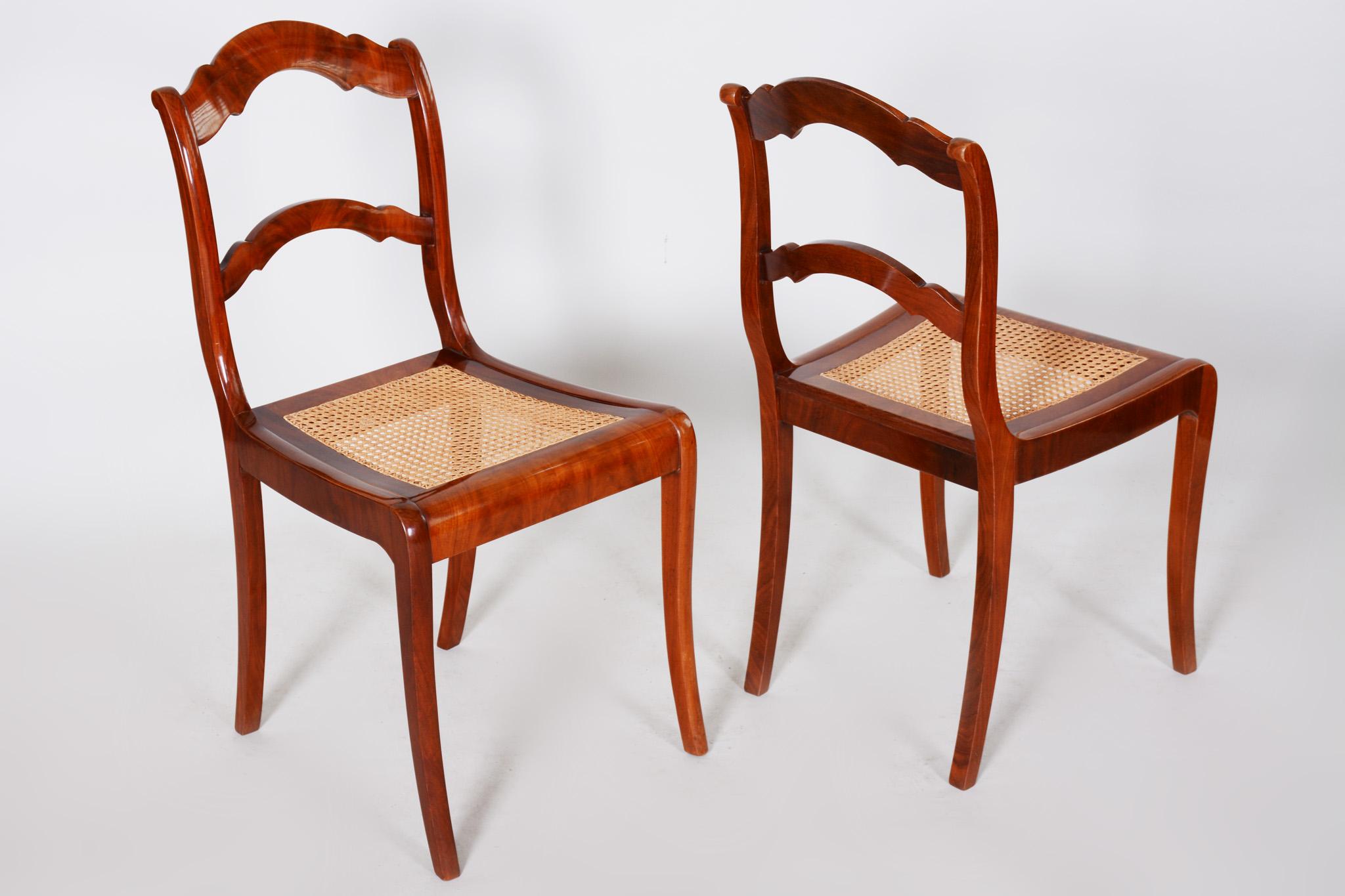 Wood 19th Century Pair of Mahogany German Biedermeier Chairs, New Wickerwork Pedig For Sale