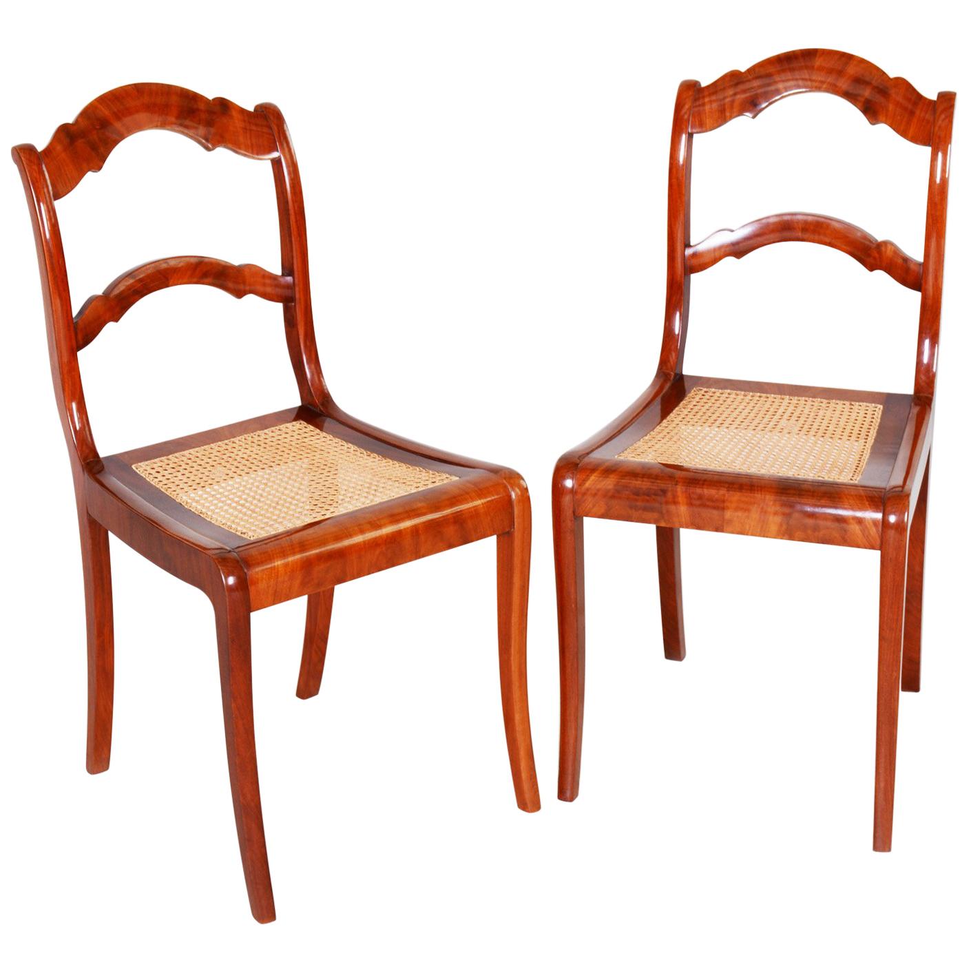 19th Century Pair of Mahogany German Biedermeier Chairs, New Wickerwork Pedig