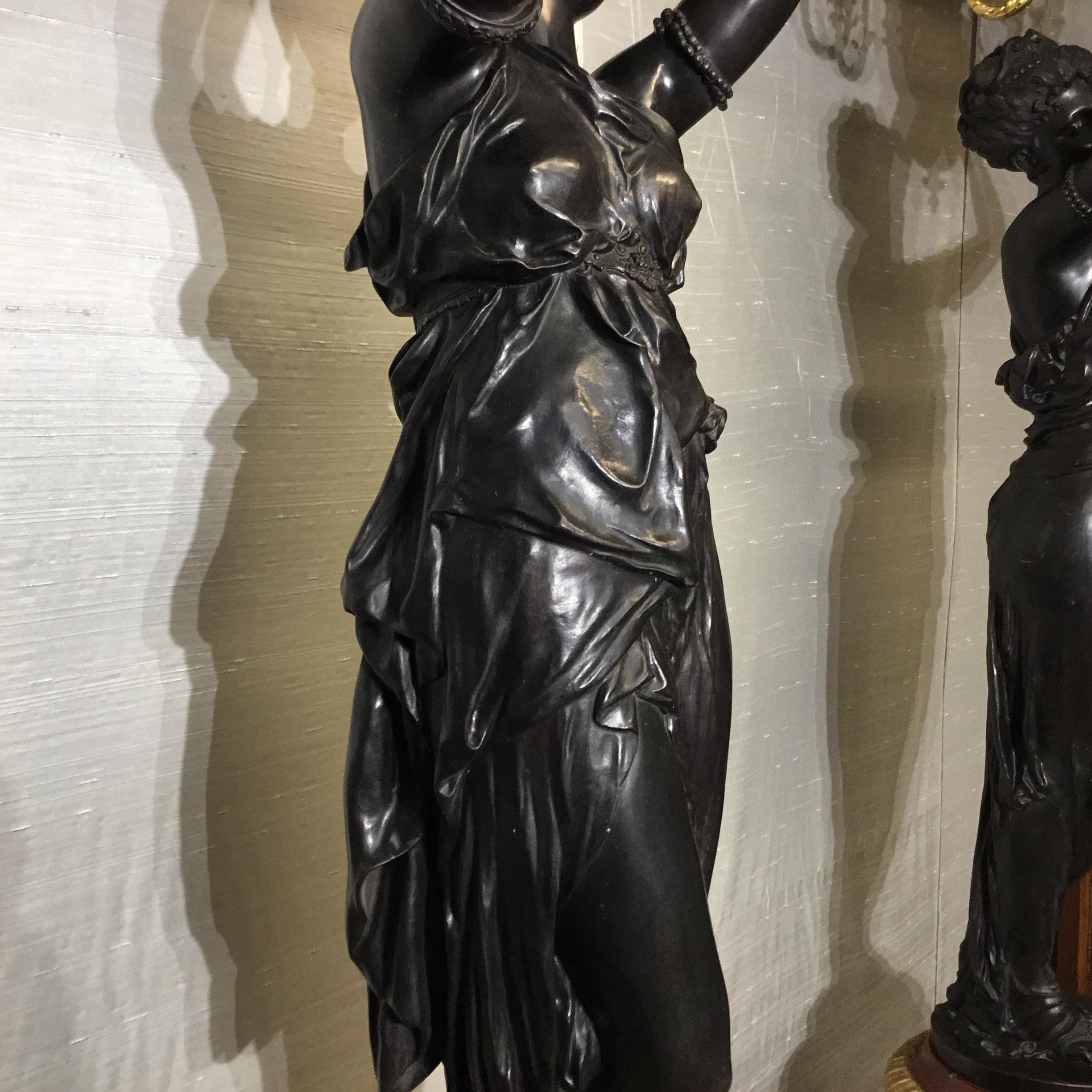 Carved 19th Century Pair of Marble Base Patinated Bronze Figurative Torcheres For Sale