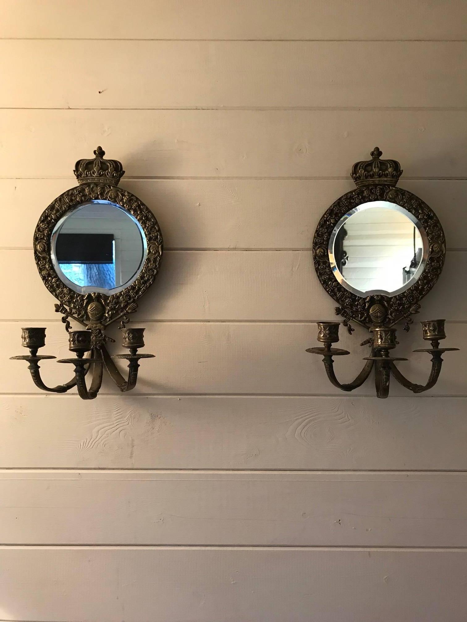 A pair of interesting mirrored appliques with armorial coat of arms. Can be rewired. Probably French.