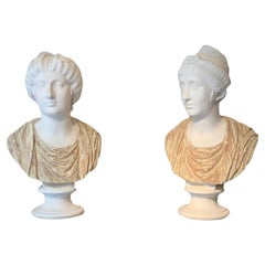 19th CENTURY PAIR OF NEOCLASSICAL BUSTS IN TERRACOTTA AND PLASTER