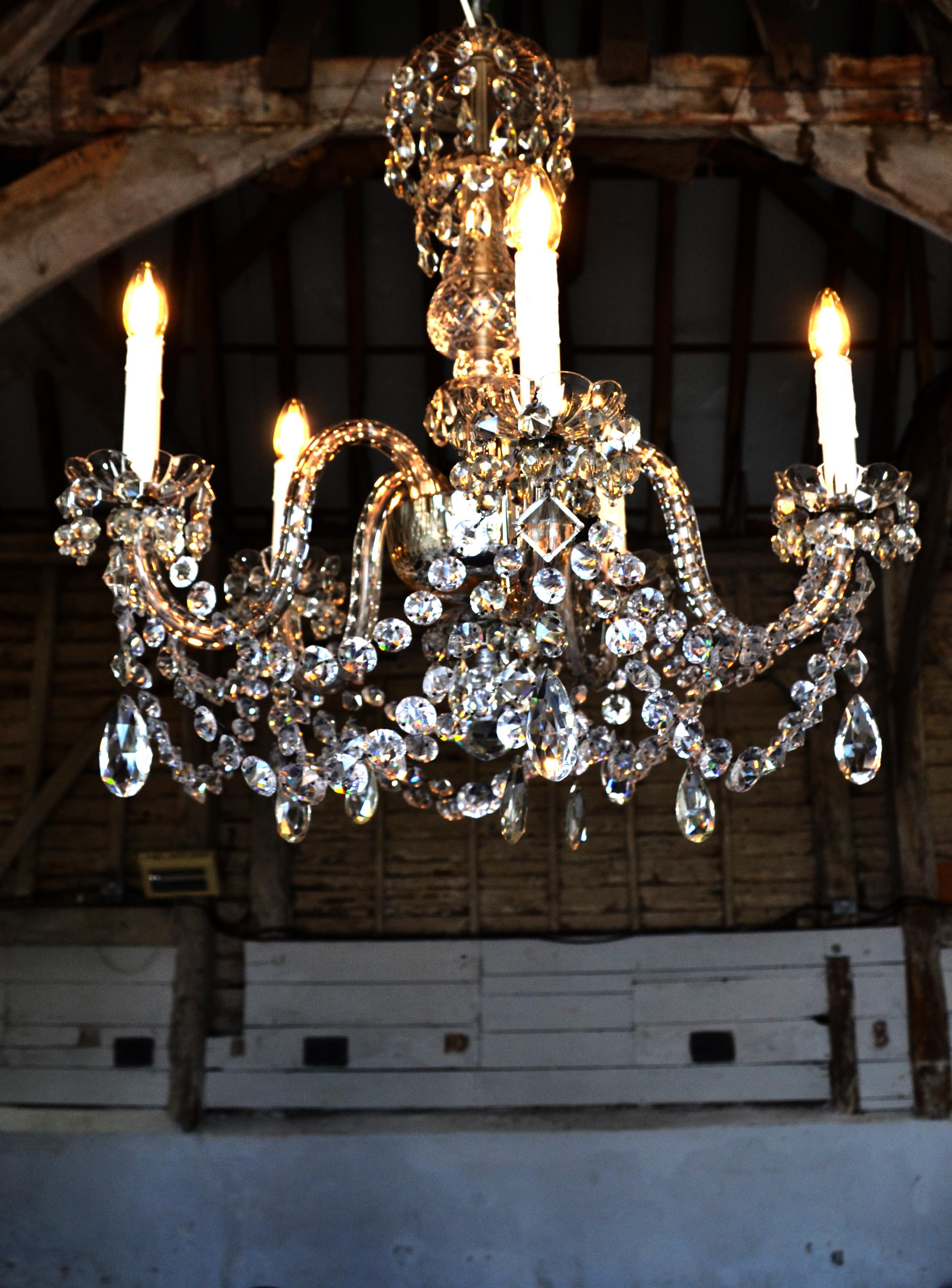 A very fine pair of late Victorian Circa 1870, hand blown and finest Old English cut crystal 5 light chandeliers with silver plated fixtures. They have been sympathetically converted to electricity no holes have been drilled, re-wired and accept 5 x