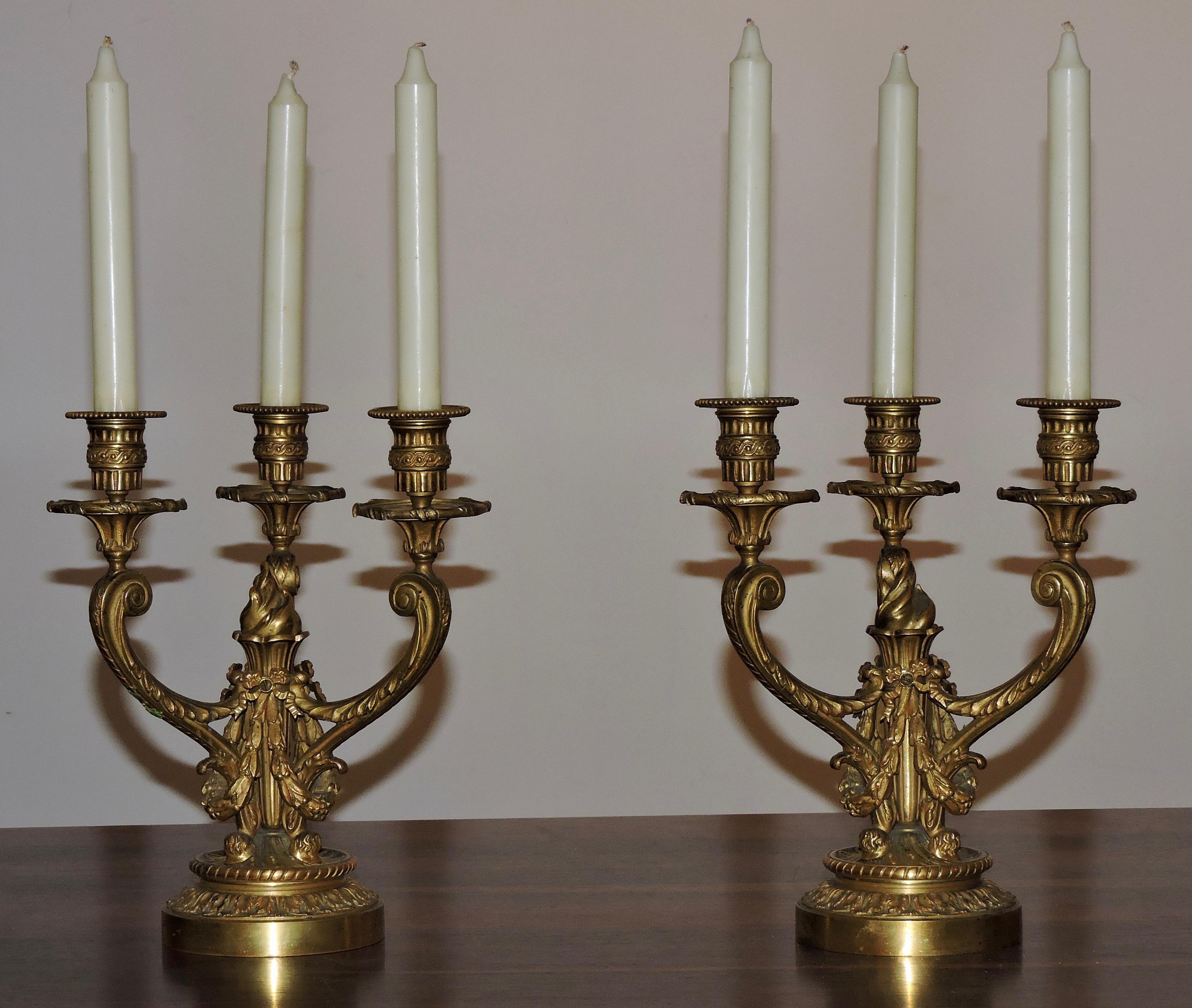 French 19th century pair of ormolu three-lights candelabras
Louis XVI style,
circa 1880.
 