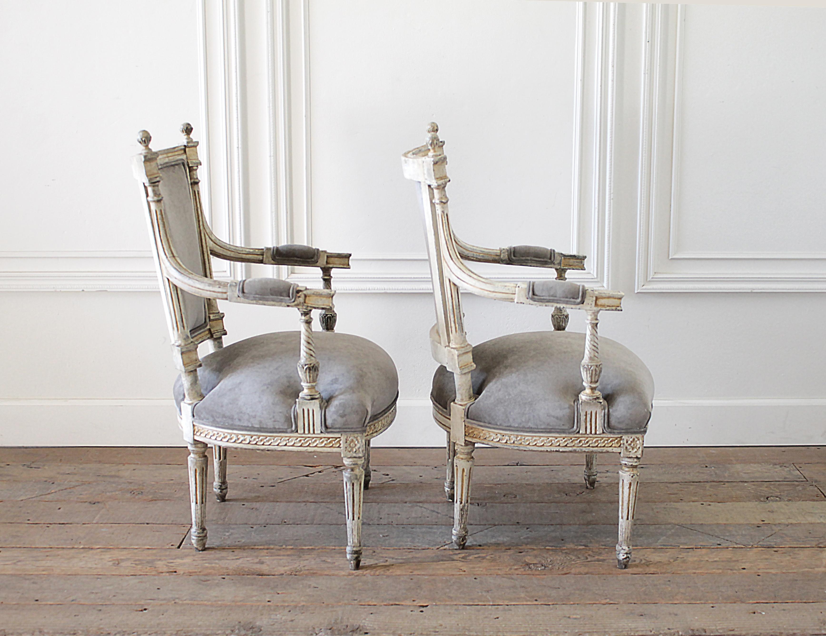Velvet 19th Century Pair of Painted and Upholstered Louis XVI Style Open Arm Fauteuils For Sale