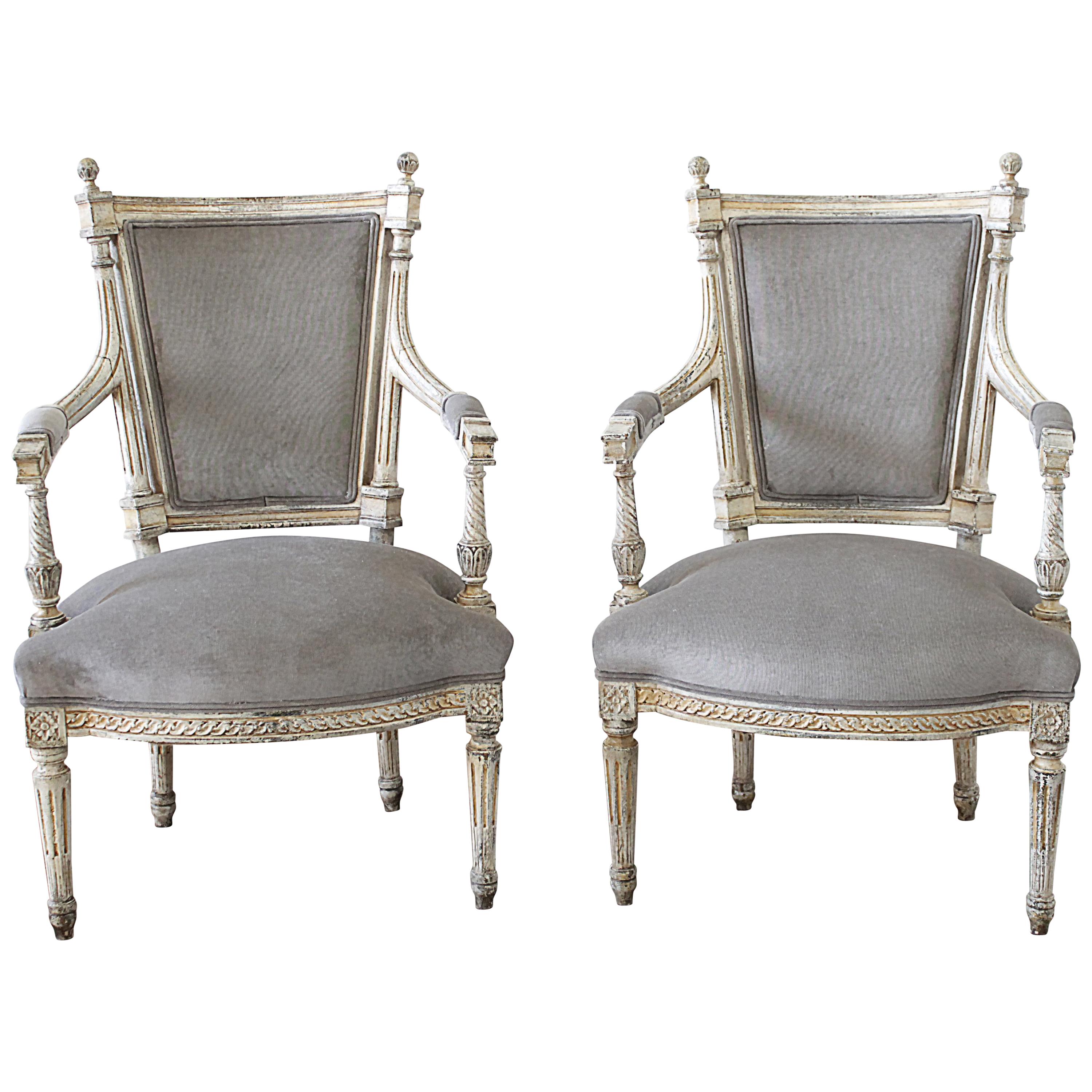 19th Century Pair of Painted and Upholstered Louis XVI Style Open Arm Fauteuils