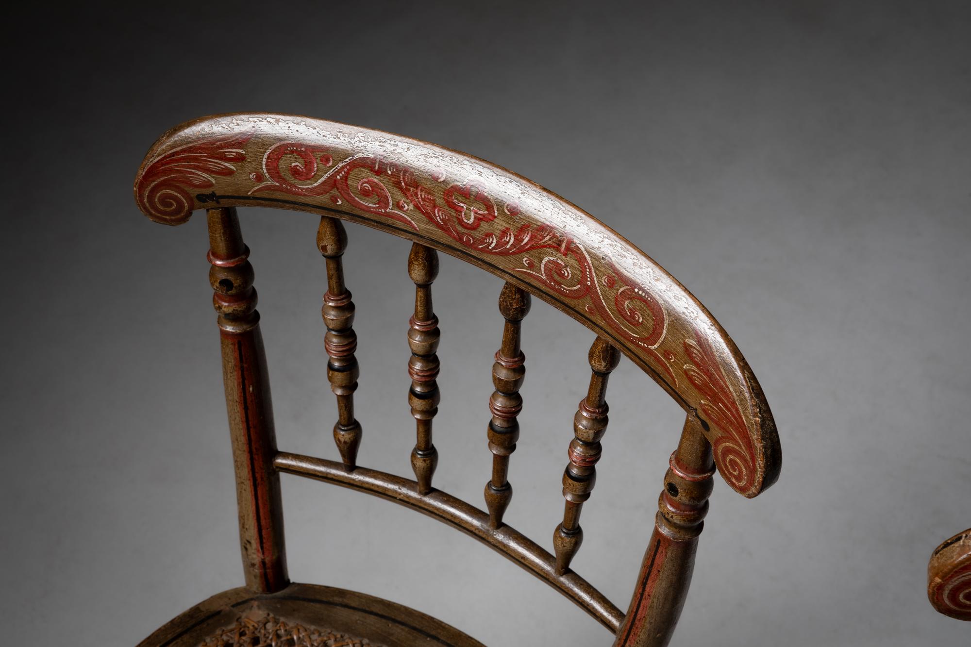 This exquisite pair of 19th-century European chairs embodies the graceful design and craftsmanship of the era. Made from fine wood, these armless chairs feature a subtly curved silhouette, giving them an elegant and refined appearance. The chairs