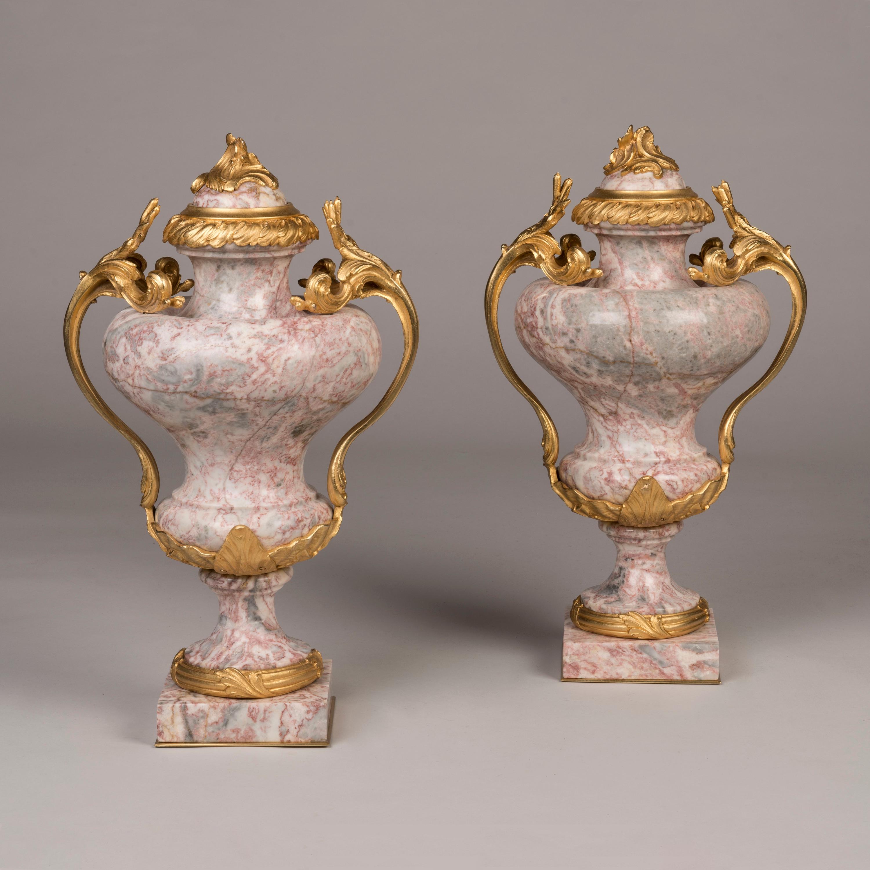 French 19th century pair of Pink Marble Vases in the Louis XV Manner For Sale