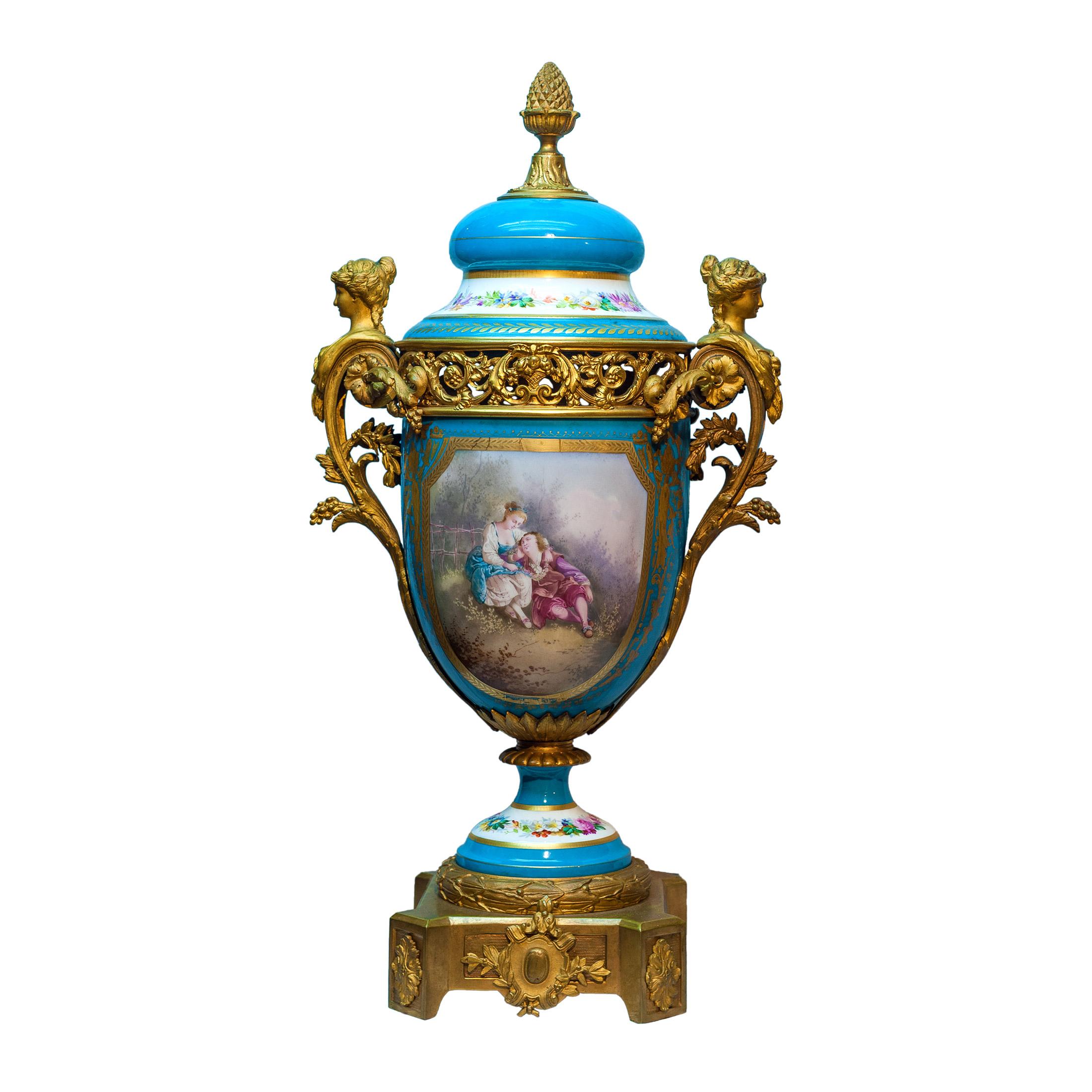 Beautifully hand painted with lovers to the front and a bouquet to the reverse and with figural ormolu-mounted handles.

Date: 19th century
Origin: French
Dimension: 27 in. x 14 in.