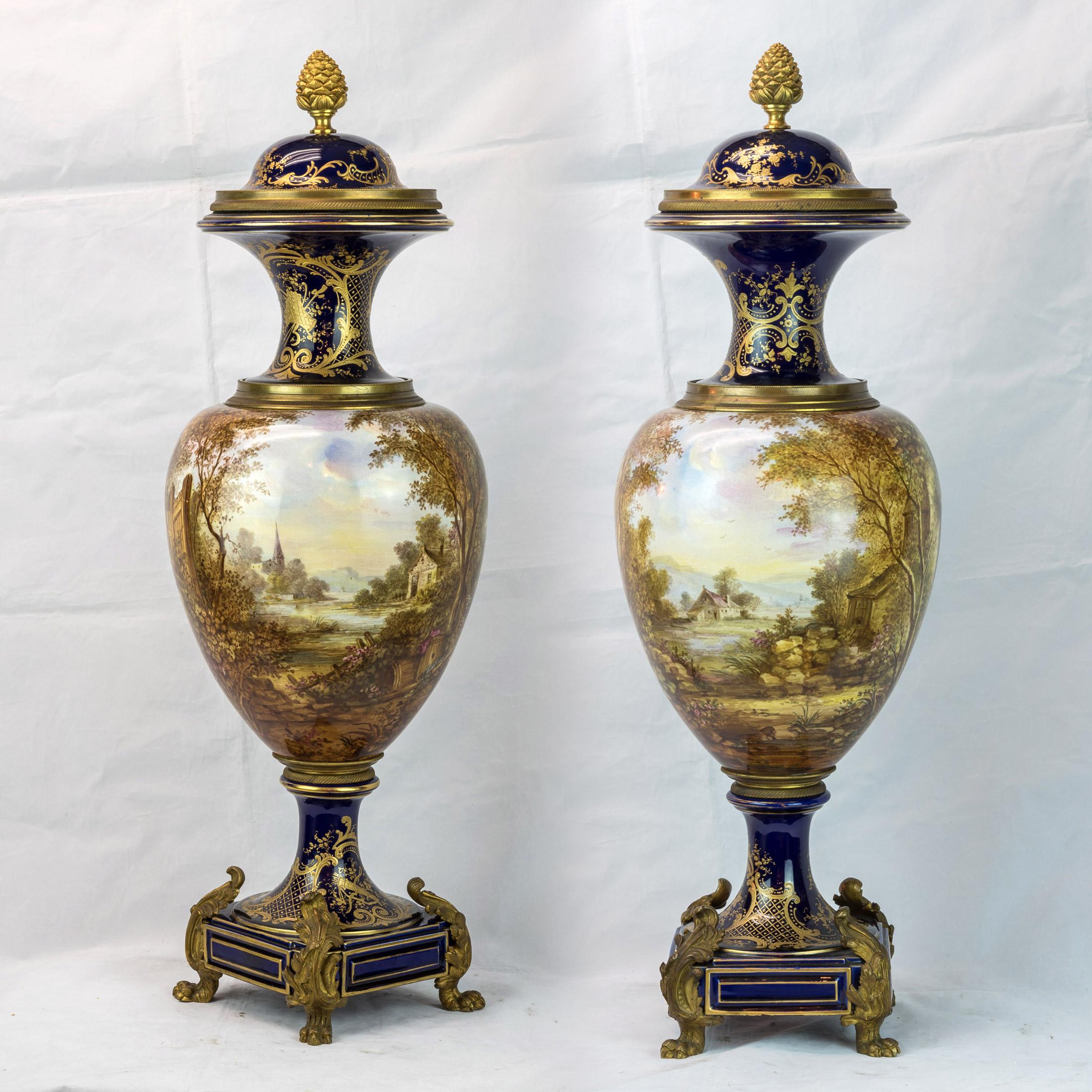 A very Fine pair of Sèvres style ormolu-mounted gilt bronze cobalt blue porcelain bases.
Each with waisted neck decorated with gilt on cobalt blue and above a tapering ovoid body painted in the round with a continuous scene of a prince on