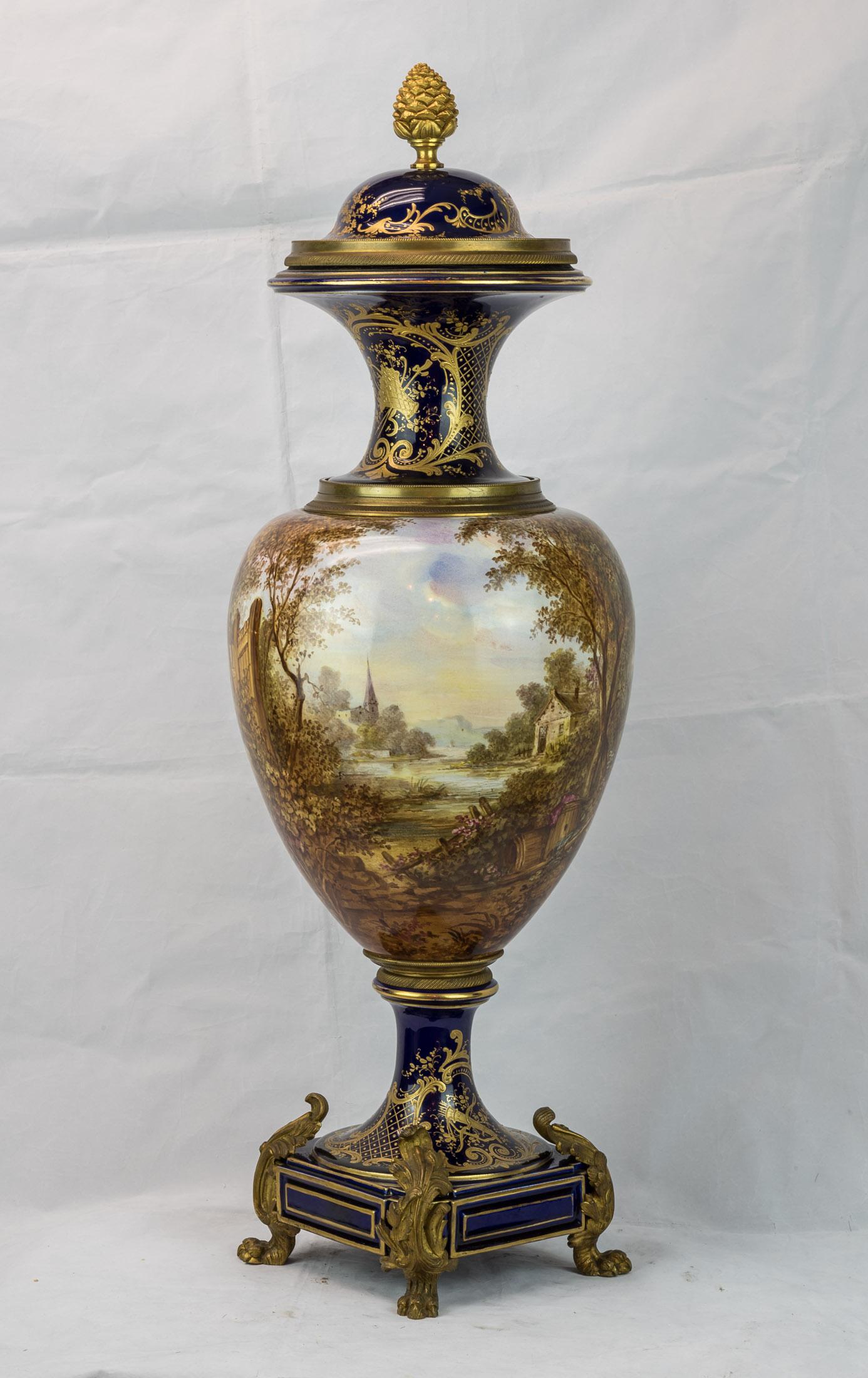 19th Century Pair of Sèvres Style Ormolu-Mounted Cobalt Blue Porcelain Vases In Good Condition For Sale In New York, NY