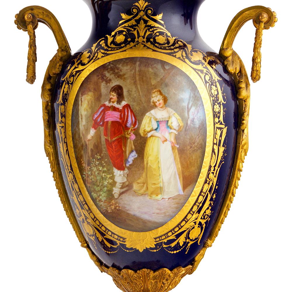 The beaded porcelains are beautifully hand painted with lovers to the front and a landscape scene in verso.

Date: 19th century
Origin: French
Dimension: 16 1/2 in x 18 1/2 in.