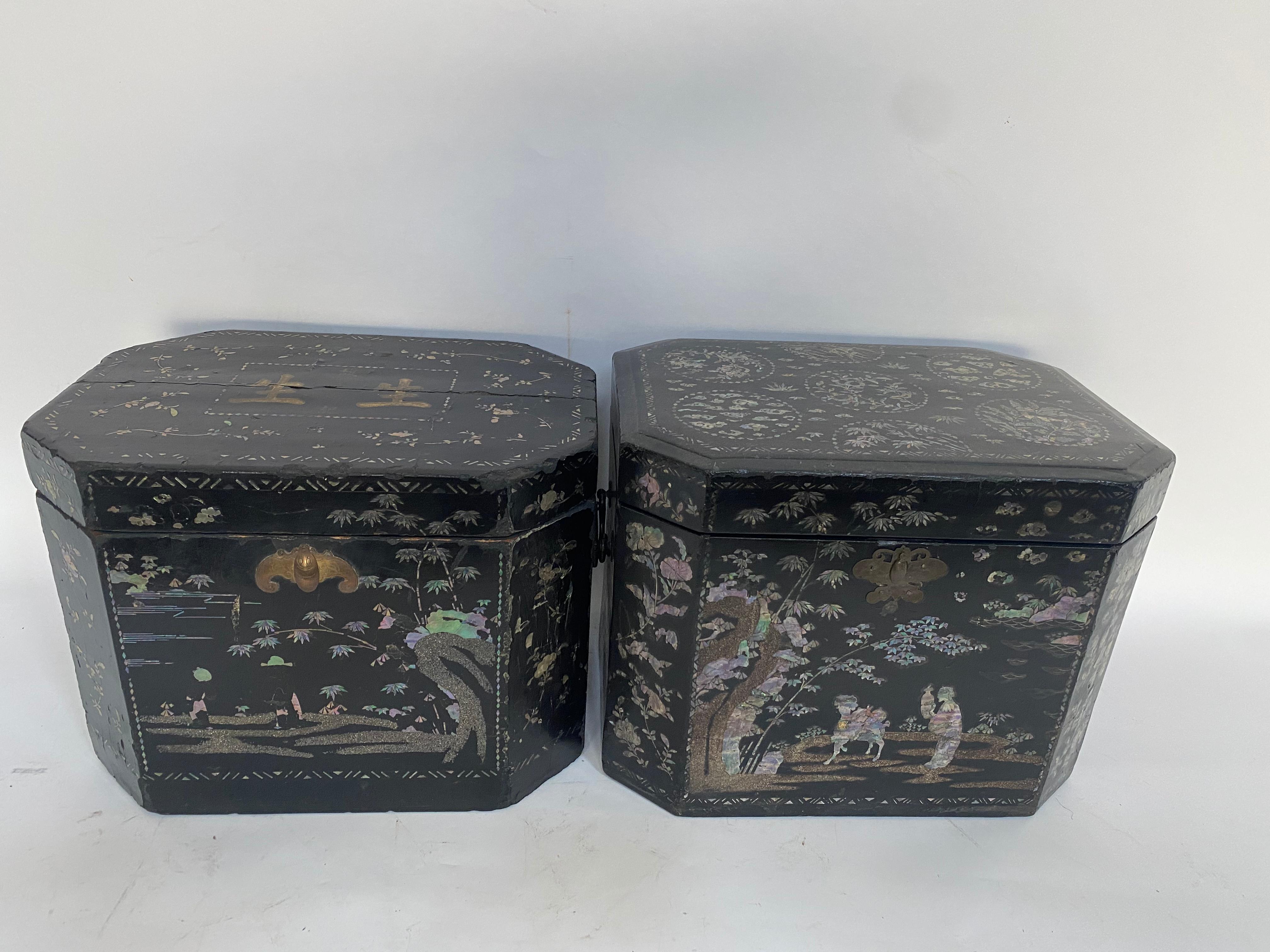 19th century pair of shell Inlaid black lacquer big Chinese storage boxes with bail handles two sides, each with hinged lid reversing to a mother of pearl inlaid decoration, each tea caddies 14.5