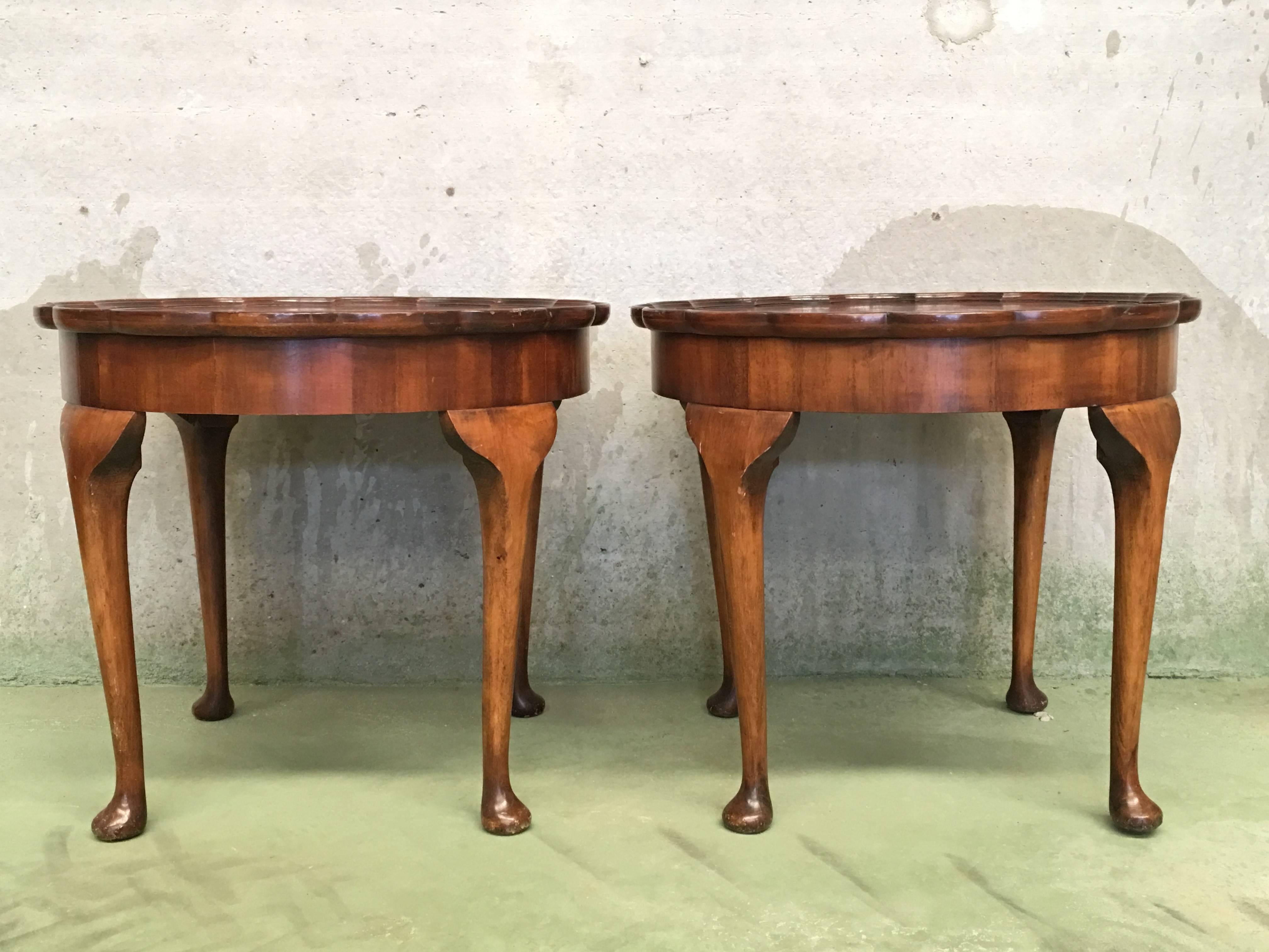 19th pair of side salon tables with fleur top in walnut.