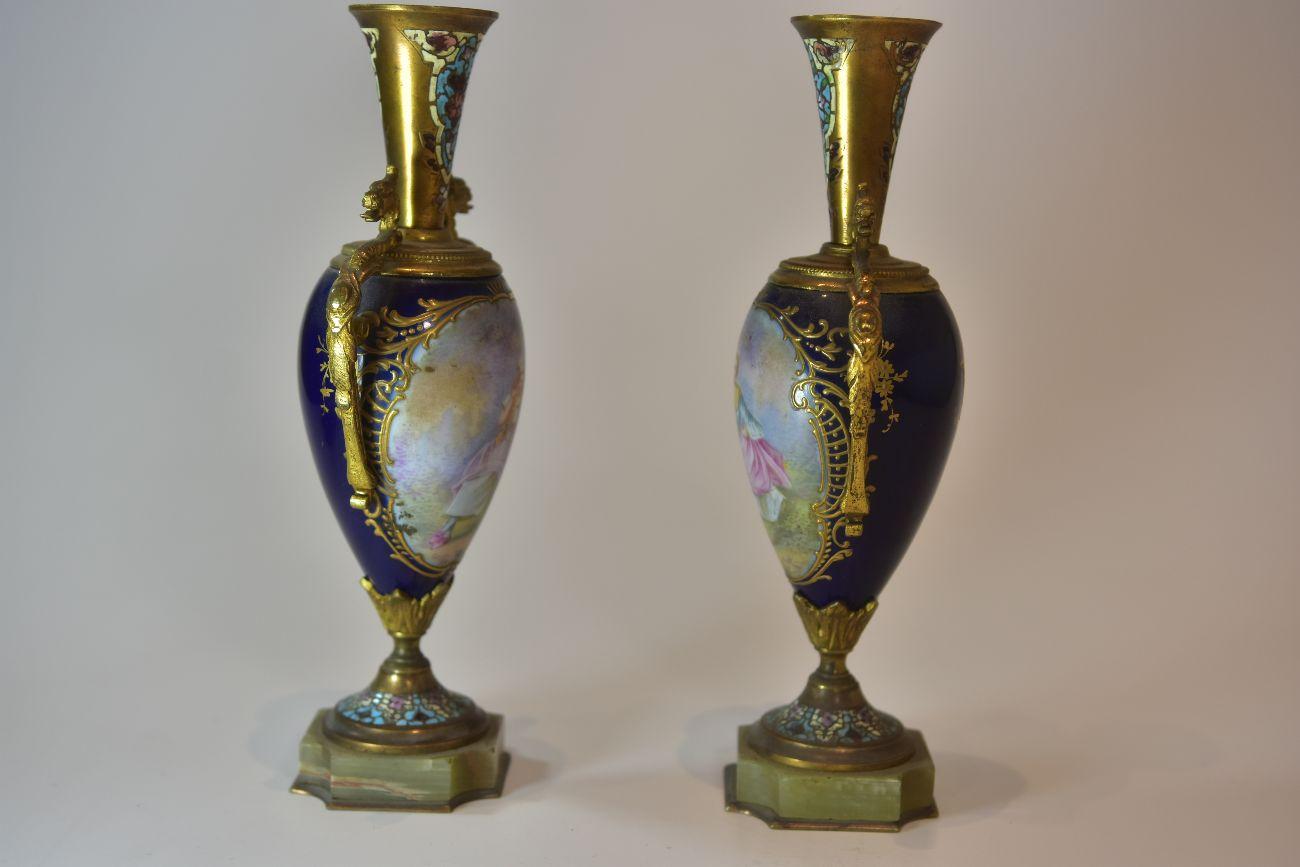 19th century pair of small old Sèvres blue porcelain vases 19th century gilt bronze frame.
