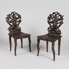 19th Century Pair of Swiss Black Forest Carved Lindenwood Chairs With Bear Motif