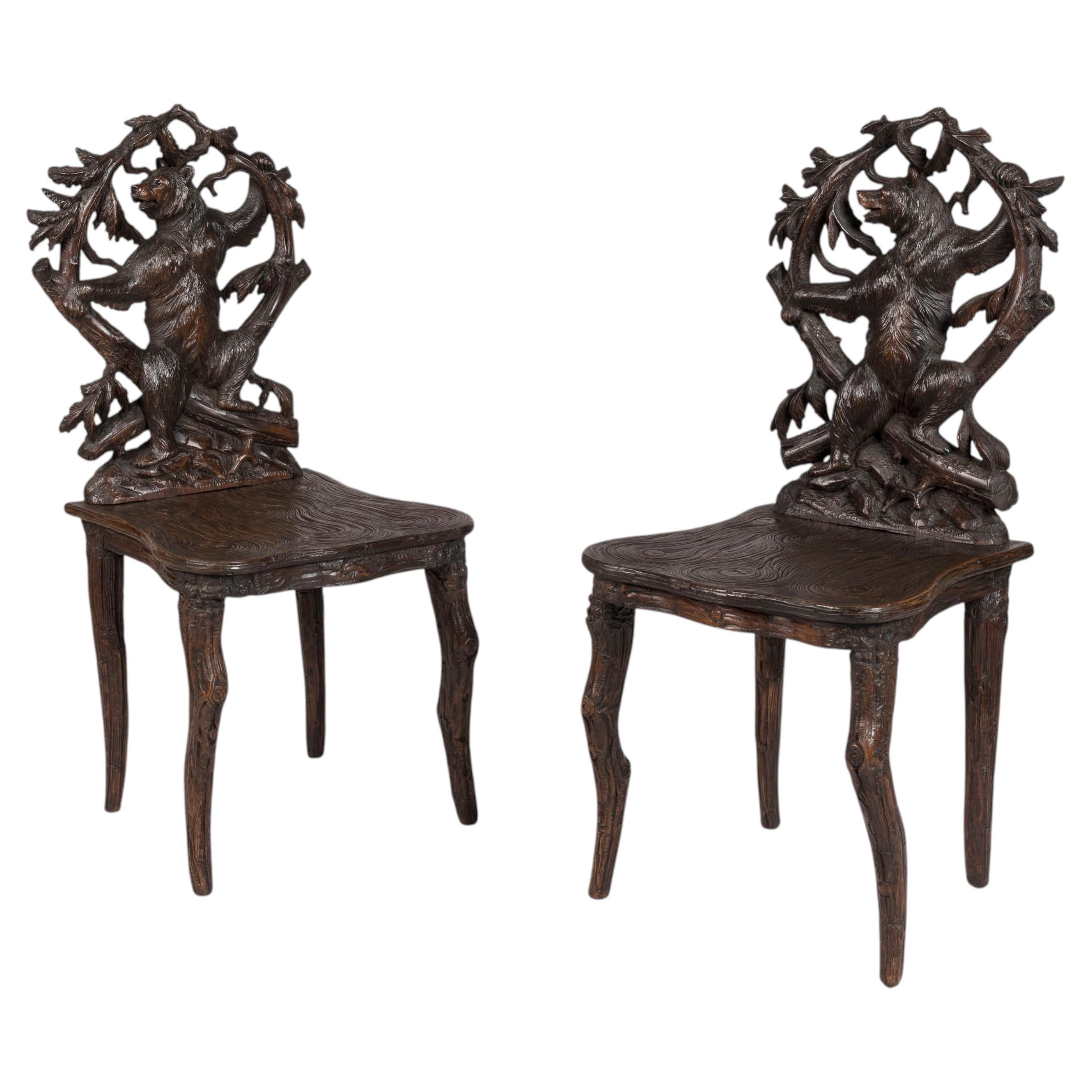 19th Century Pair of Swiss Black Forest Carved Lindenwood Chairs With Bear Motif