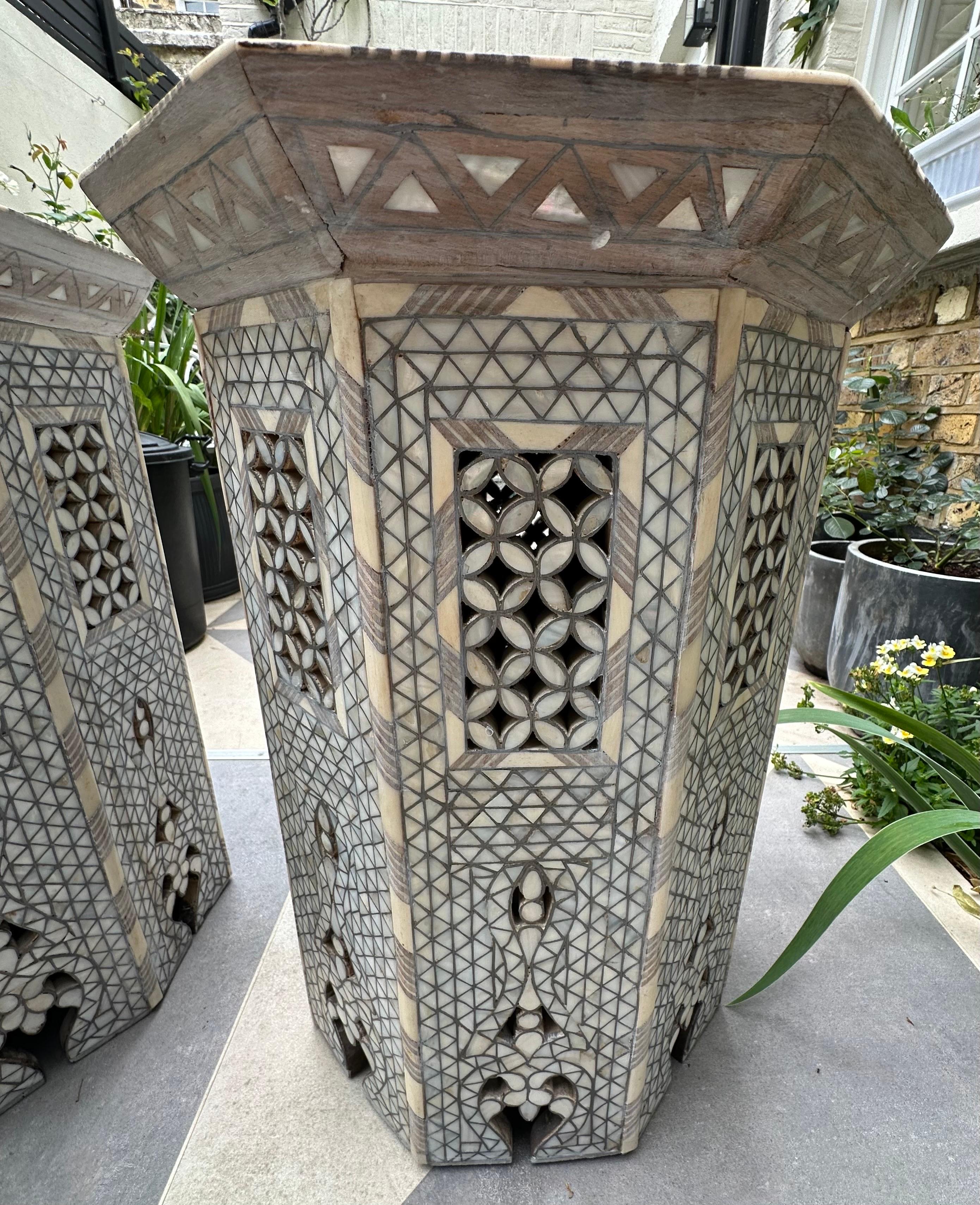 Beautiful and rare pair of Syrian tables, inlaid with mother of pearl in geometric patterns. All inlay is in tact with no missing pieces.
Perfect for a variety of interiors, as an occasional table in a living room or bedroom side table. Would suit