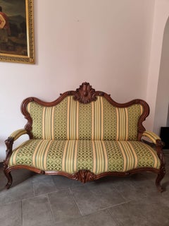 19th century pair of walnut sofas
