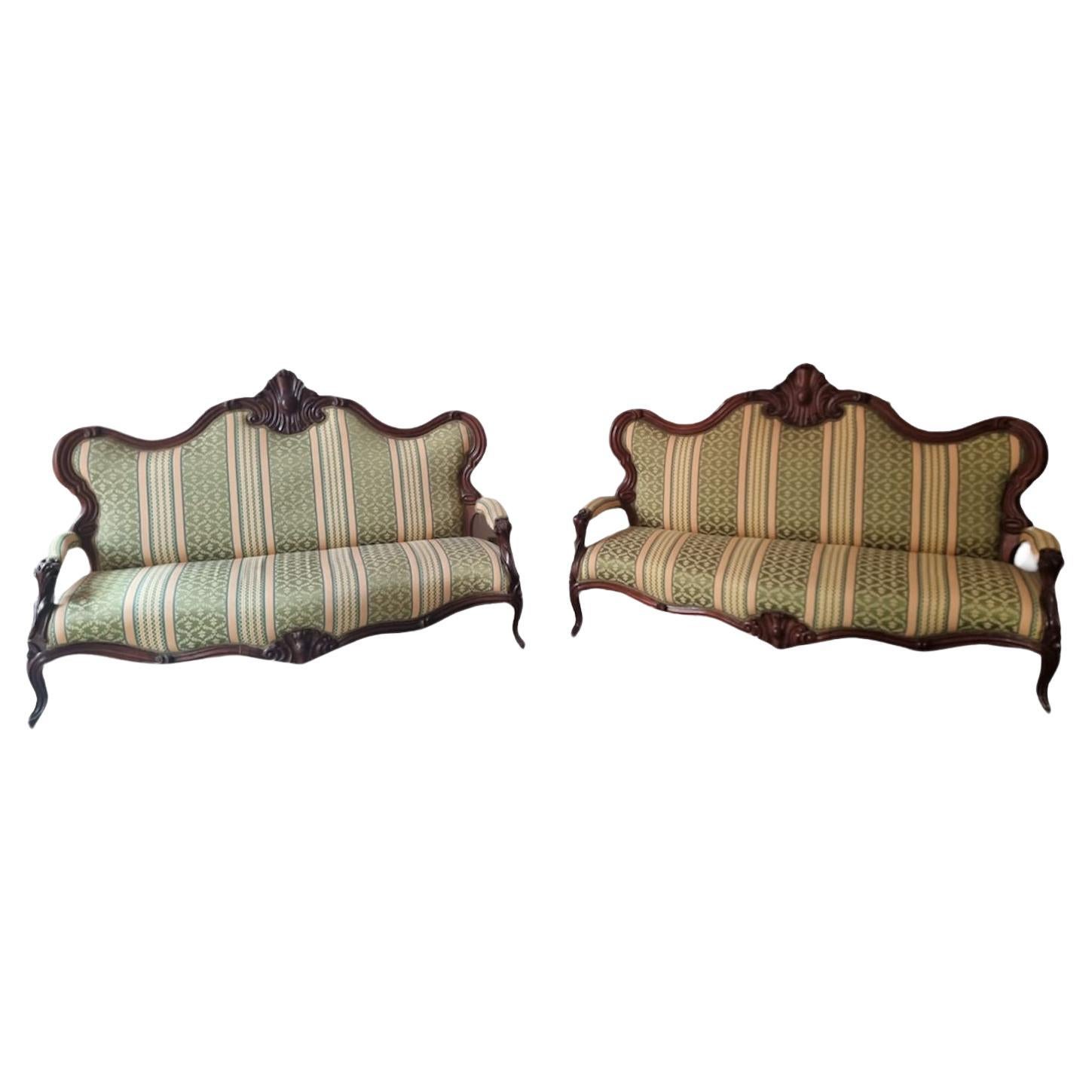 19th century pair of walnut sofas