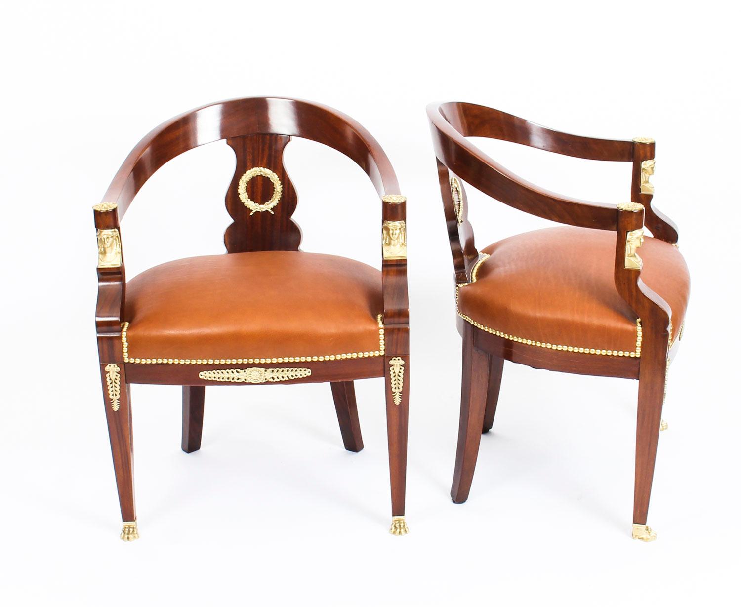 This is a fabulous pair of antique French Second Empire mahogany and ormolu mounted armchairs, circa 1880 in date.
 
The mahogany is beautiful in colour and has been embellished with striking ormolu mounts.
 
There is an ormolu sphinx decorating