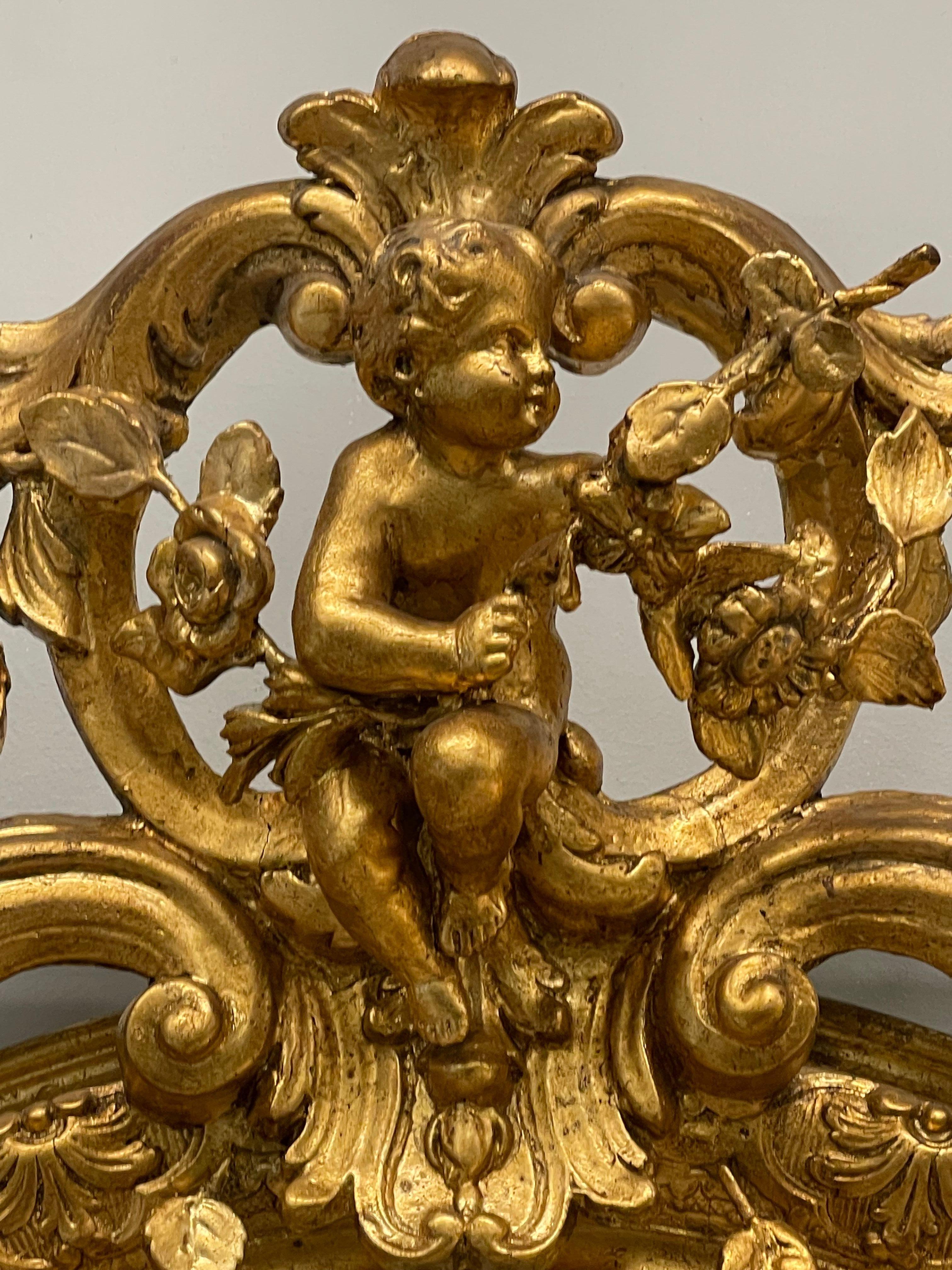 19th Century Palatial Giltwood Wall or Console Mirror Adorning Three Cherubs For Sale 2