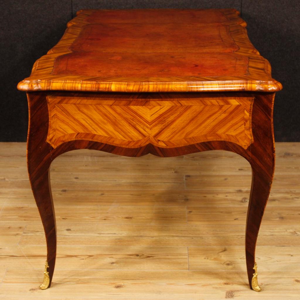 French writing desk from Napoleon III era. Exceptional quality furniture in rosewood, walnut and palisander, nicely decorated with gilded and chiseled bronzes. Writing desk ideal to be placed in a living room or studio, finished for the center.