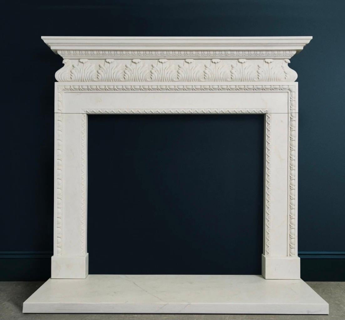 An ornate 19th century Palladian style deeply carved Statuary marble fireplace surround. A moulded shelf rests on a cornice of repeating Egg & Dart, below a bolection shaped frieze with well carved acanthus leaves returned into itself, mounted on an