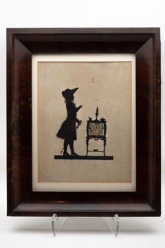 19th Century Paper Cut Silhouette of Gentleman in Front of a Table