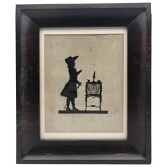 19th Century Paper Cut Silhouette of Gentleman in Front of a Table