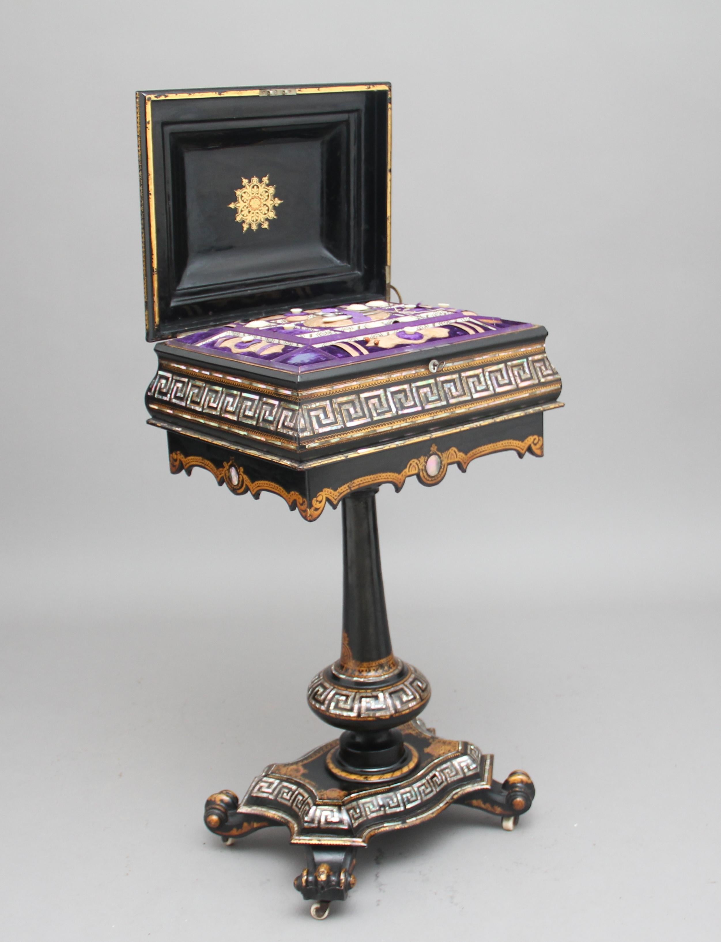 A fabulous quality 19th century papier-mache work table in lovely original condition, it’s decorated all-over with mother of pearl and gilding, wonderfully shaped top opening to reveal a velvet lined interior with various apparatus and compartments,