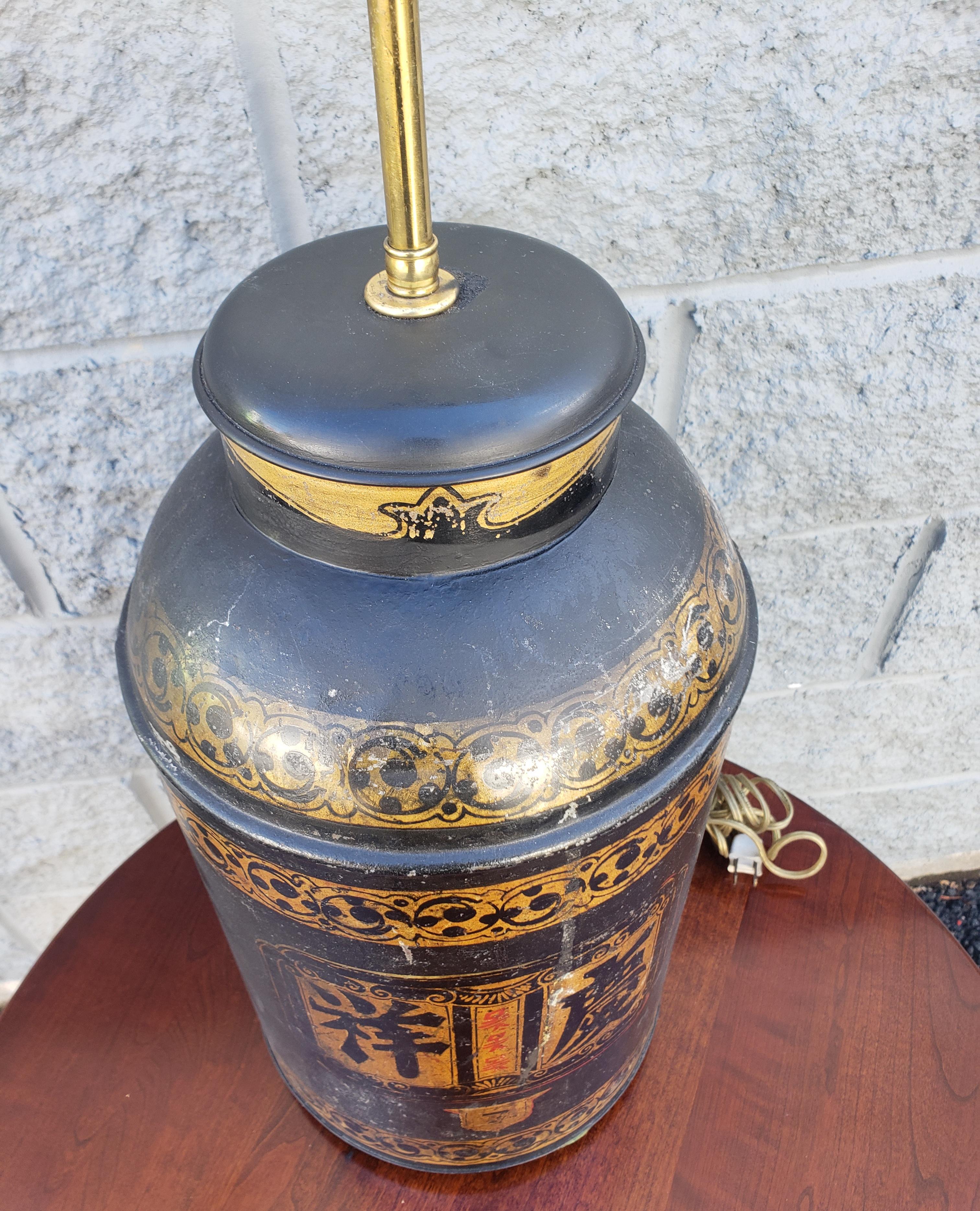 Chinese Export 19th Century Parcel Gilt  and Ebonized  Weighted Tea Canister Dual Lights Lamp For Sale