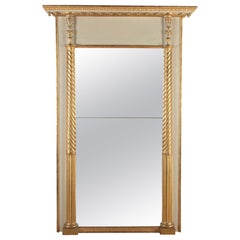 Miroir Empire doré à la feuille du XIXe siècle