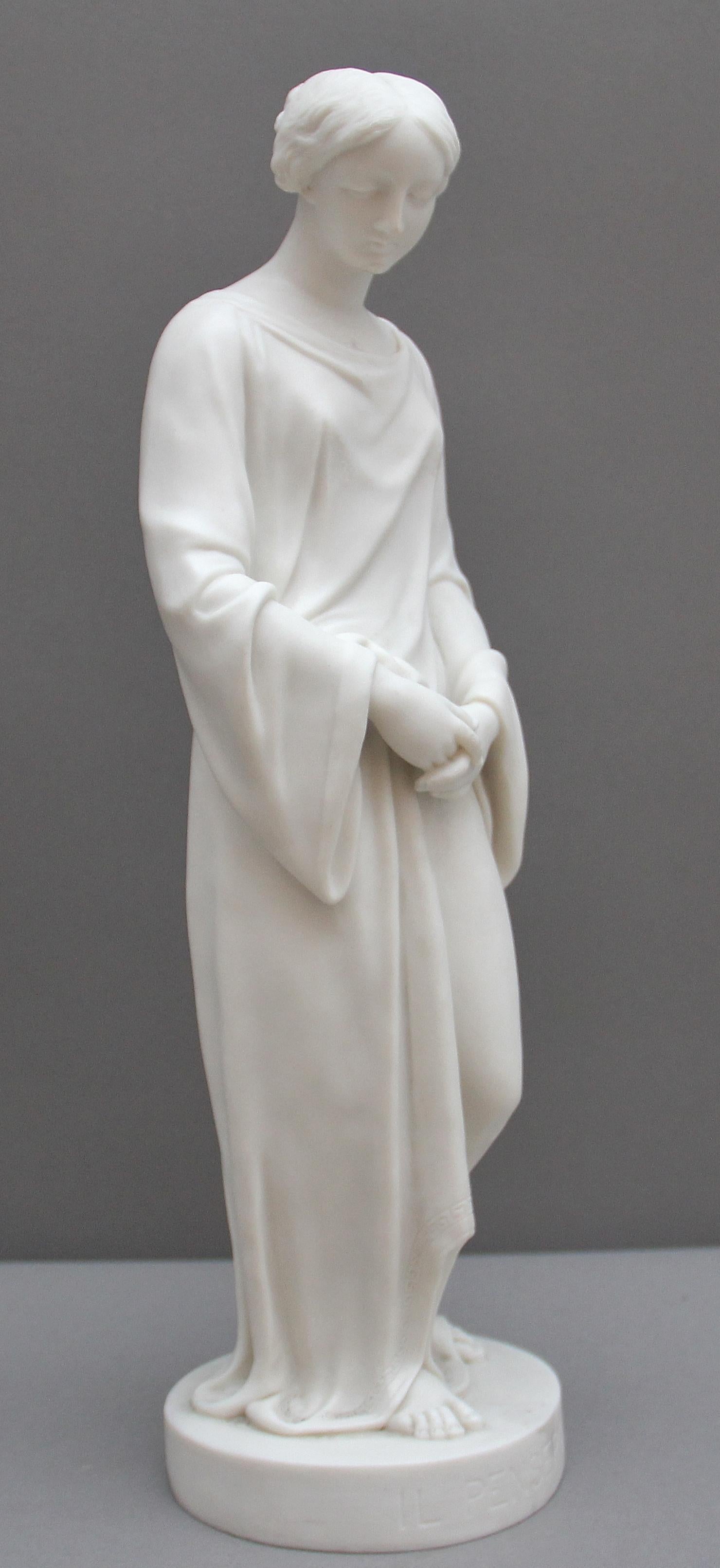19th century parian figure attributed to Worcester “Il Penseroso” A draped female figure with downcast eyes standing on a circular base named Il Penseroso and signed Papworth. In very good condition with minor damage to the base (see photo) circa