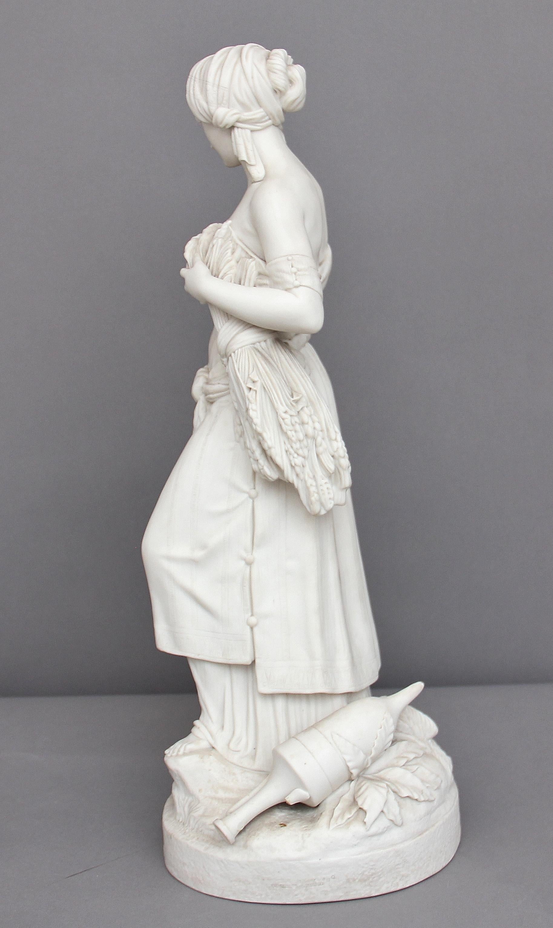 19th century parian figure of Ruth carrying sheave’s of corn, perfect apart from a broken handle on the ewer by her feet, circa 1860.