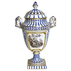 Urne à couvercle en porcelaine de Paris du XIXe siècle à décor bleu, or et sépia