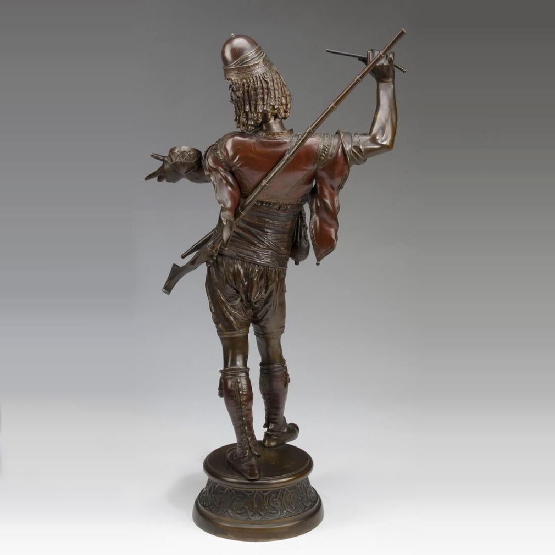 A stunning patinated bronze sculpture of an ottoman warrior by Emile Guillemin.
Entitled ‘Bashi Basouk,’ depicting an Ottoman warrior with his right hand raised, holding a stick which appears to be playing with two little drums on his left arm. With