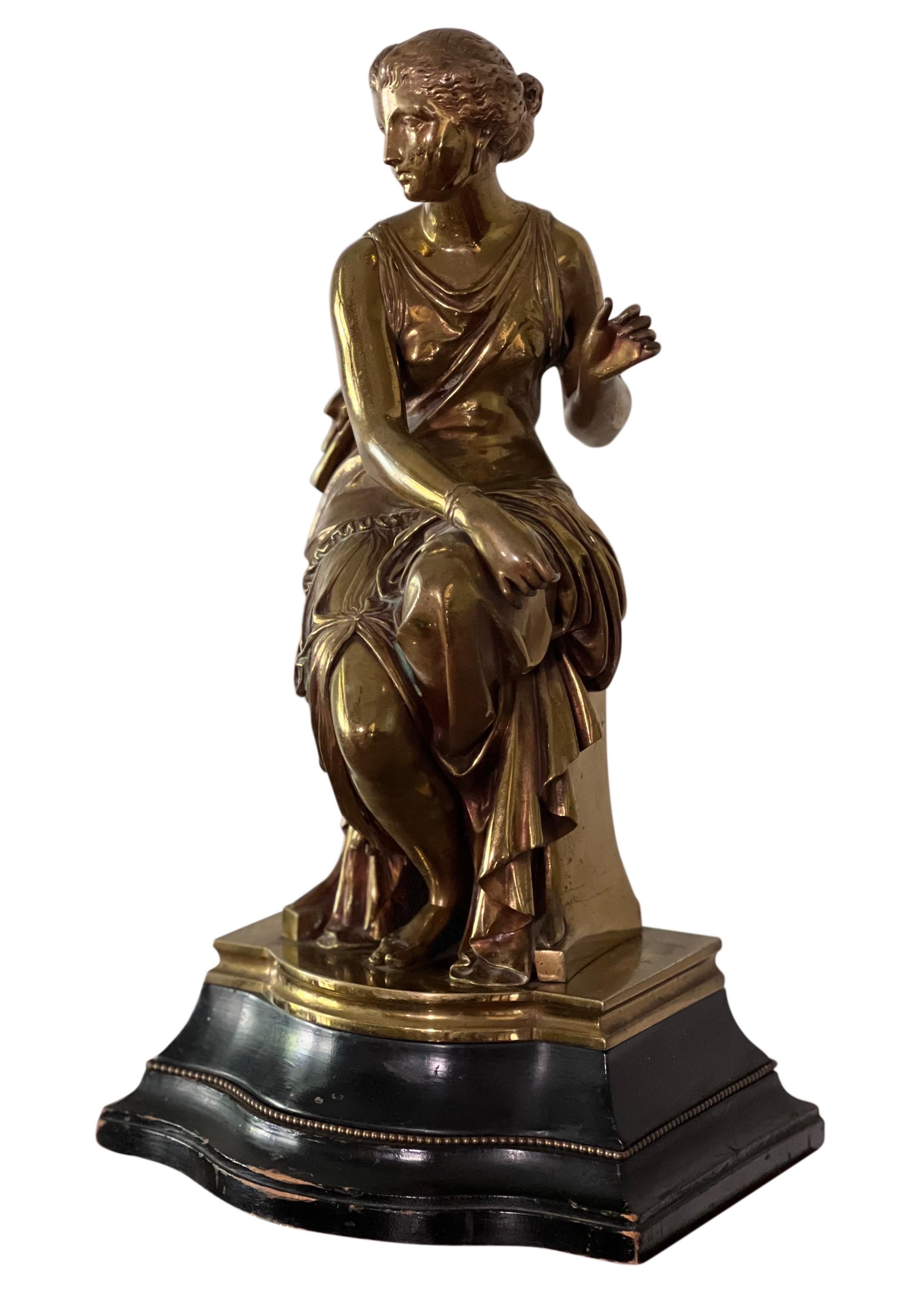 Magnificent patinated bronze sculpture by Auguste Joseph Peiffer, 19th Century, signed.

The piece features a seated maiden draped in Classical Greek attire. It is mounted on an elegant curved wood base accented with decorative bead trim. The bronze