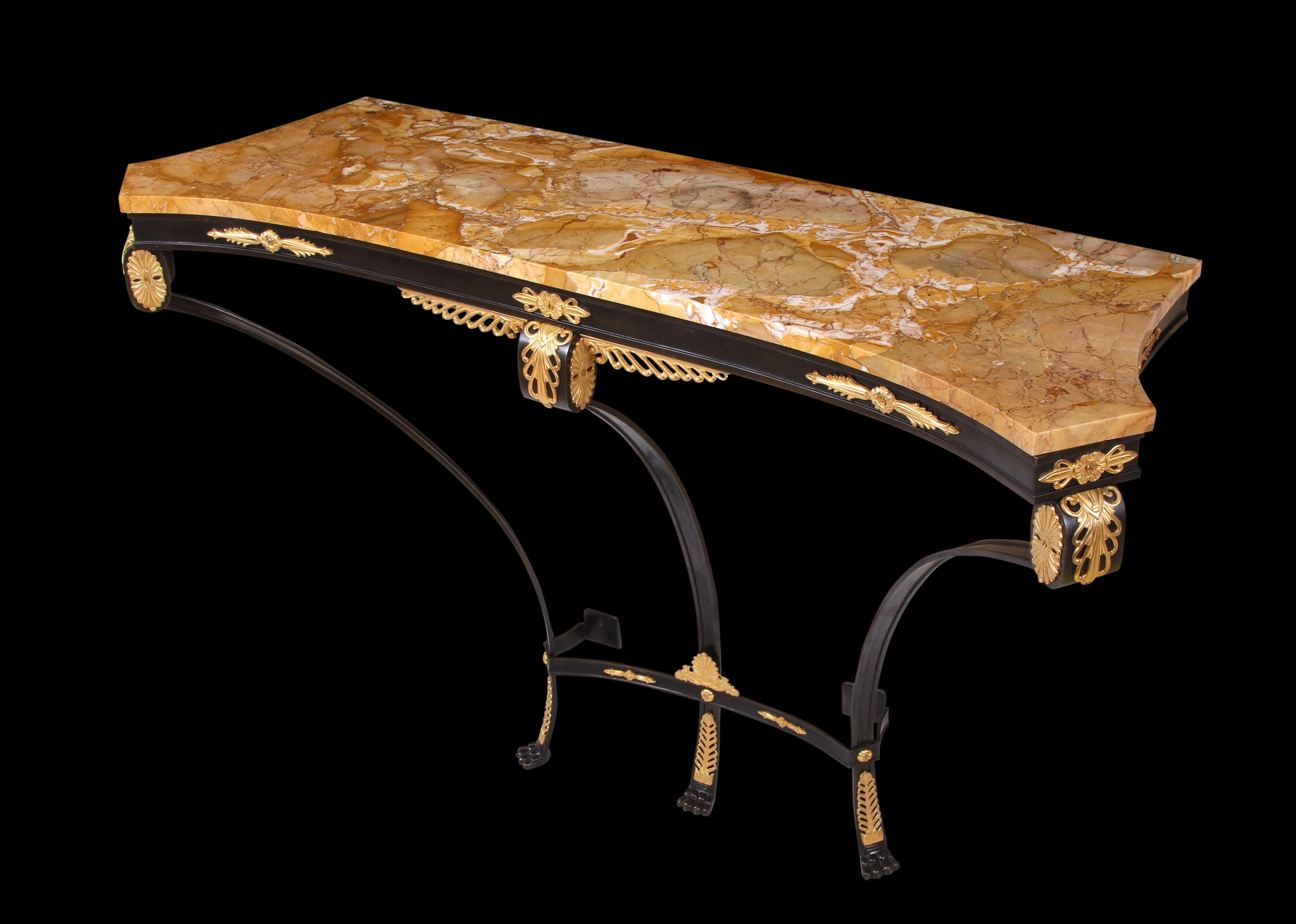 Sculpted from solid Bronze with a stunningly figured 46 inch solid Siena marble top

Rare Late 19th Century Patinated & Gilt Bronze Siena Marble Wall Mounted Hall Console Table. This incredibly beautiful neoclassical work of art exhibits a majestic