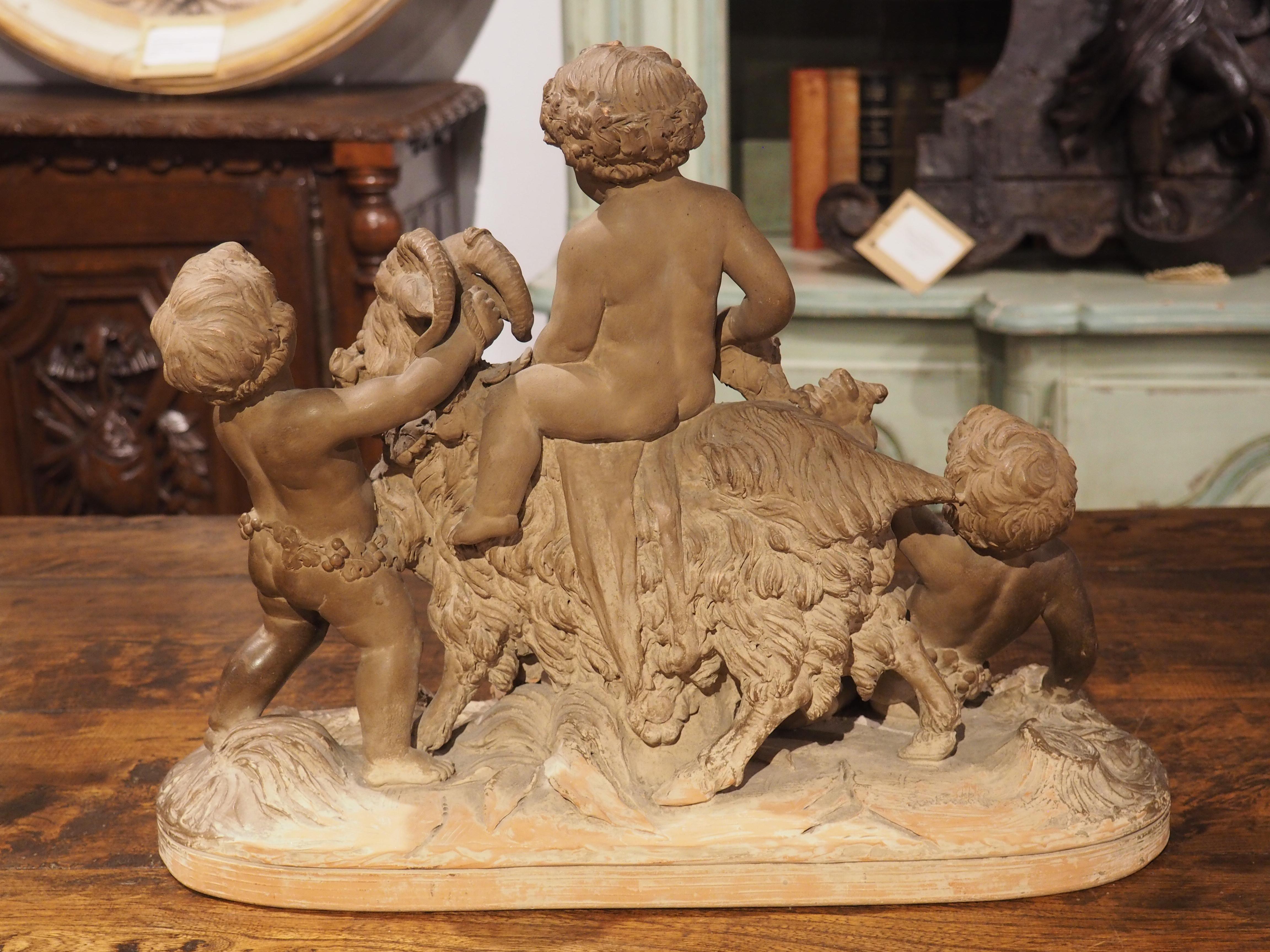 19th Century Patinated Terra Cotta of Bacchanalian Putti Playing with Goat For Sale 8