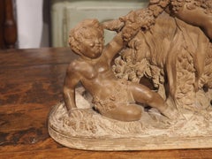 19th Century Patinated Terra Cotta of Bacchanalian Putti Playing with Goat