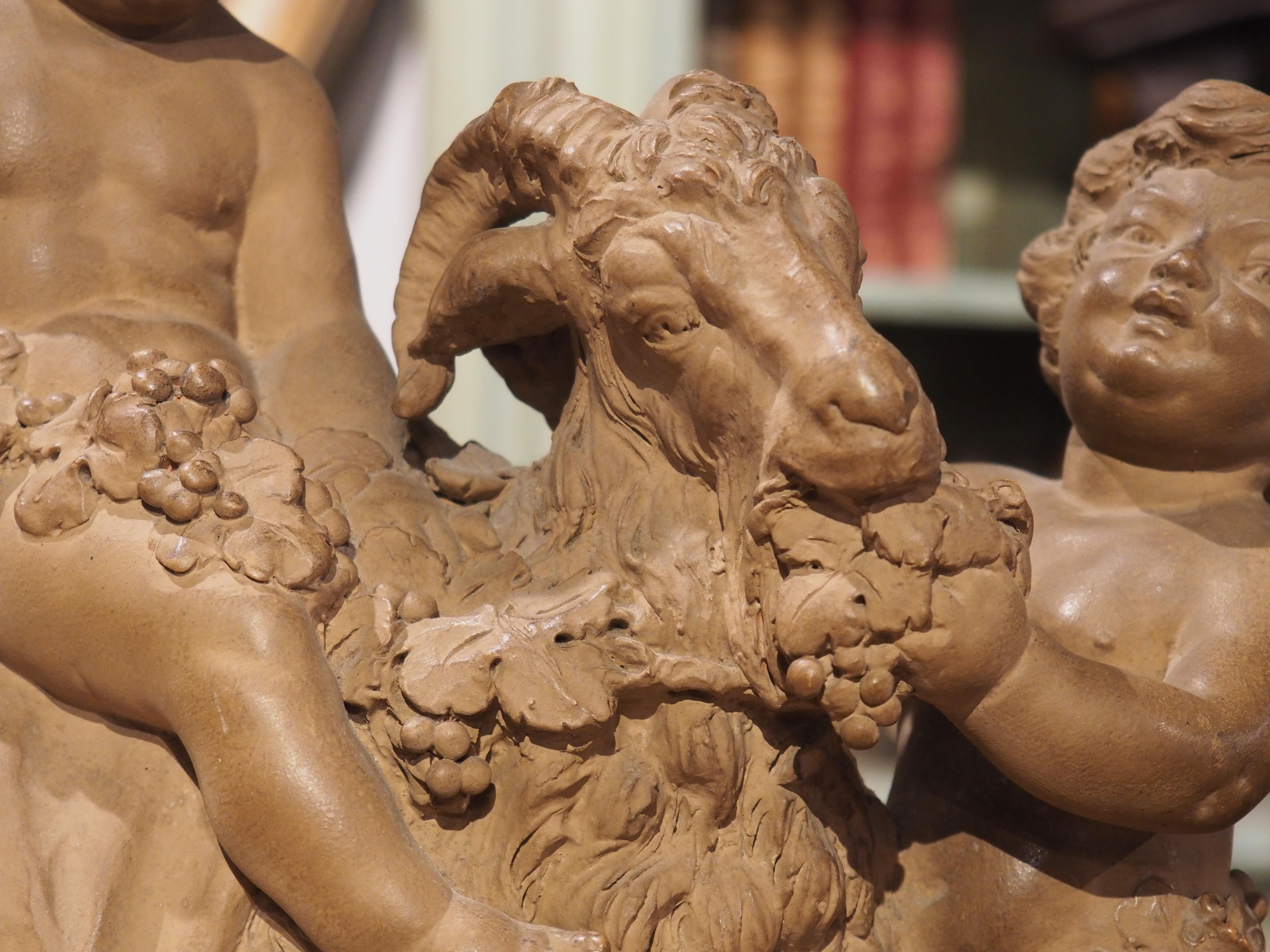 French 19th Century Patinated Terra Cotta of Bacchanalian Putti Playing with Goat For Sale