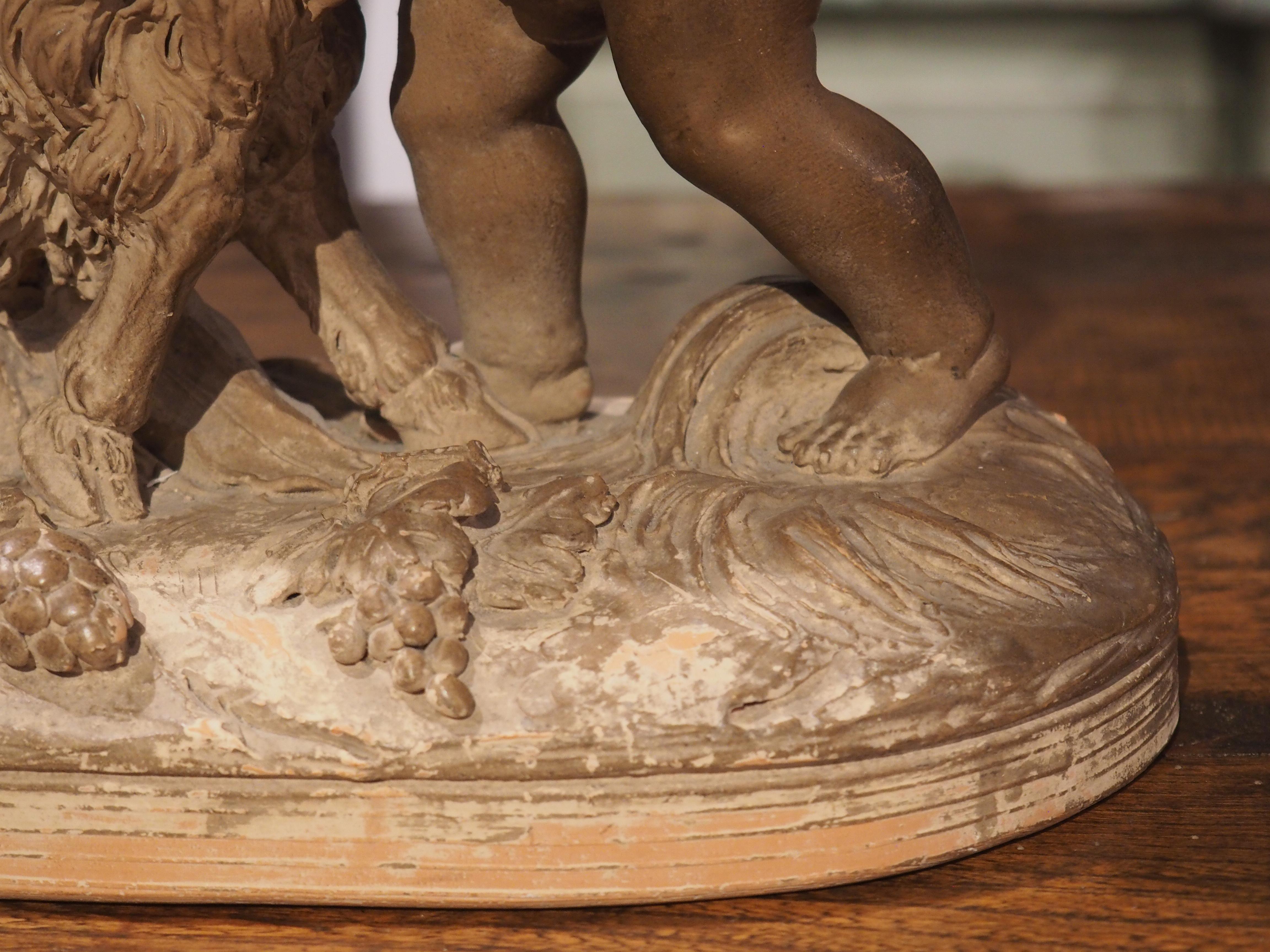 Table de Bacchanale en terre cuite patinée du 19ème siècle représentant des putti jouant avec une chèvre Bon état - En vente à Dallas, TX
