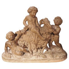 19th Century Patinated Terra Cotta of Bacchanalian Putti Playing with Goat