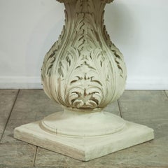 19th Century pedestal table with a Faux Marble top.