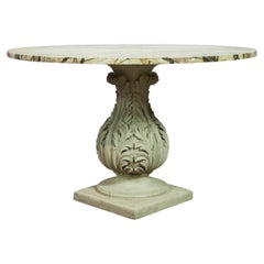 19th Century pedestal table with a Faux Marble top.